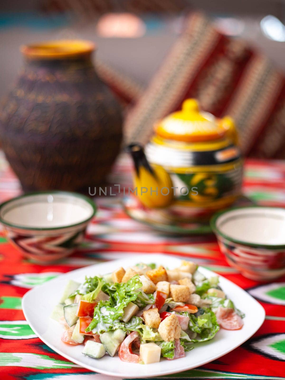 Fried beef meat in oil with potatoes, onions, bell peppers according to the Uyghur recipe. Eastern cuisine, national dish. High quality photo