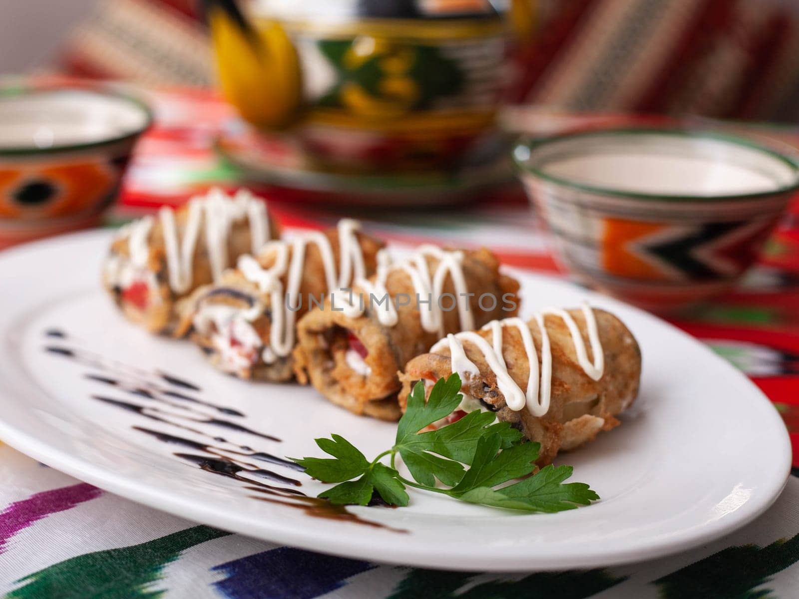 Fried eggplant rolls in breading stuffed with meat and vegetables. Asian style. High quality photo