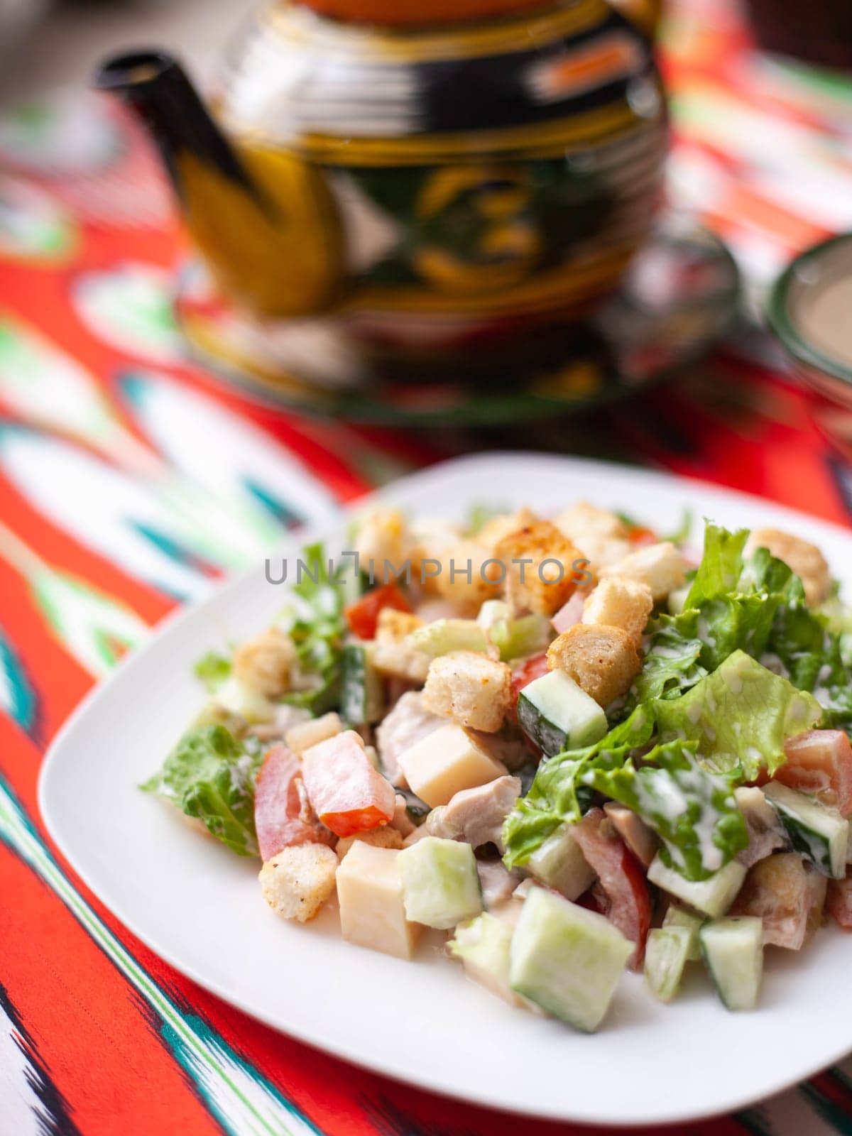 Tomato, cucumber, sweet pepper and onion salad, seasoned with oil. Asian style. High quality photo