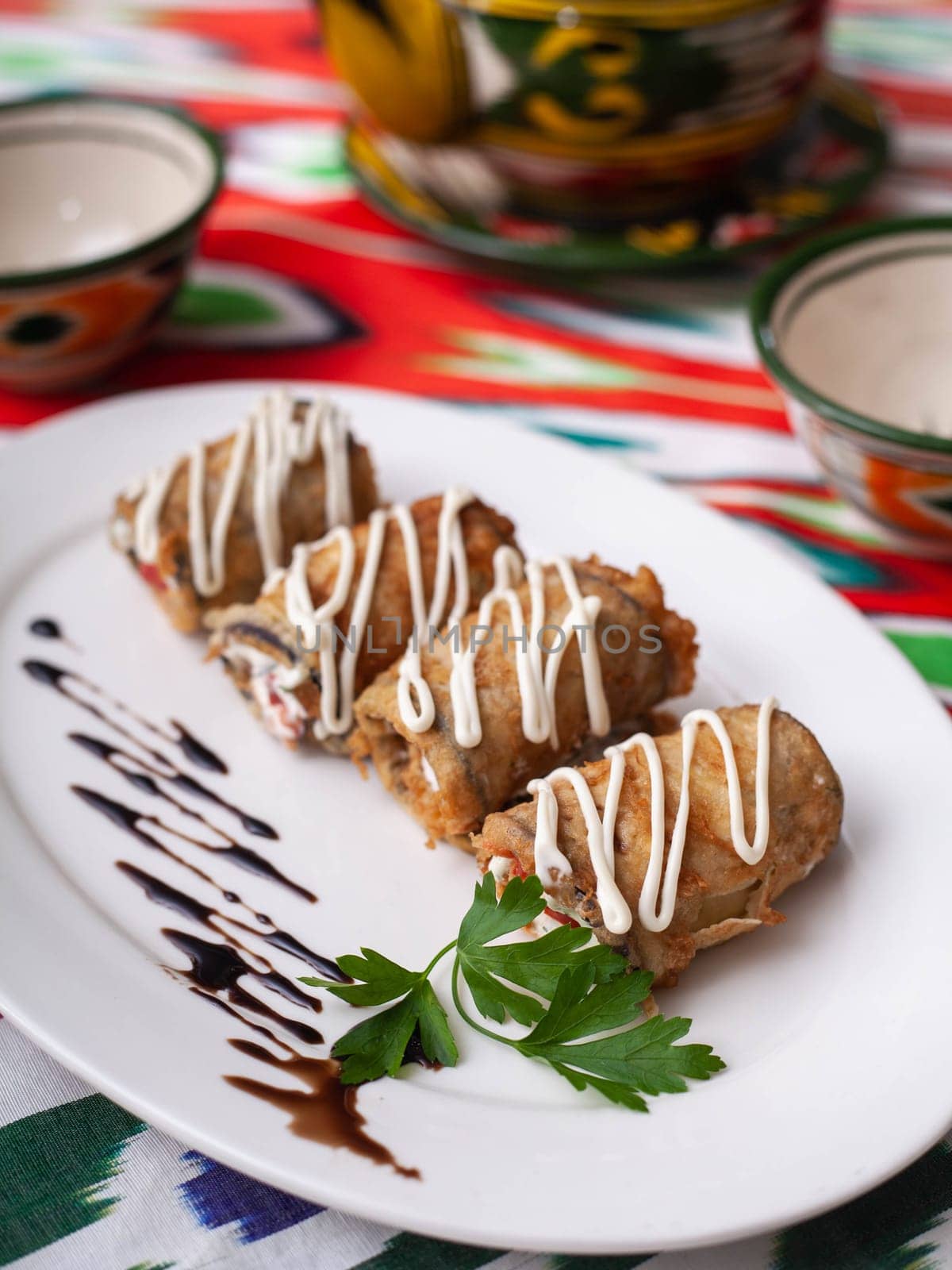 Fried eggplant rolls in breading stuffed with meat and vegetables. Asian style by tewolf