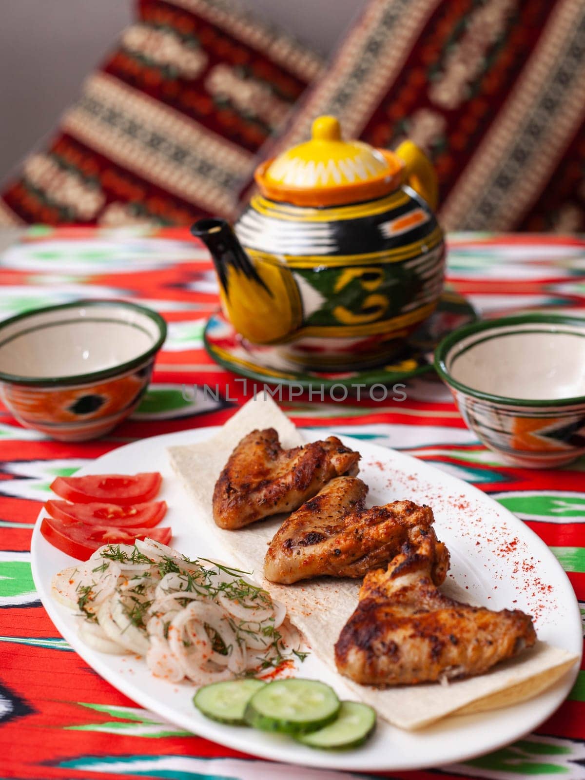 chicken kebab - charcoal grilled chicken breast.Served with vegetables, pickled onions, lavash bread and oriental sauce by tewolf