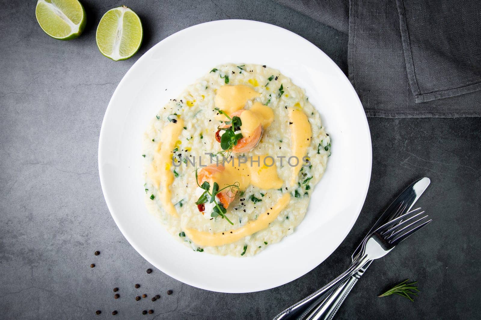 beautifully served porridge with egg and herbs top view by tewolf