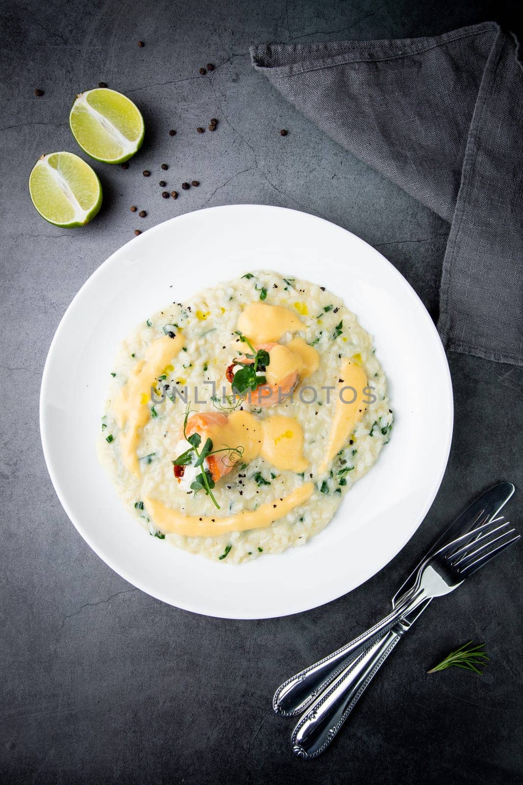 beautifully served porridge with egg and herbs top view by tewolf