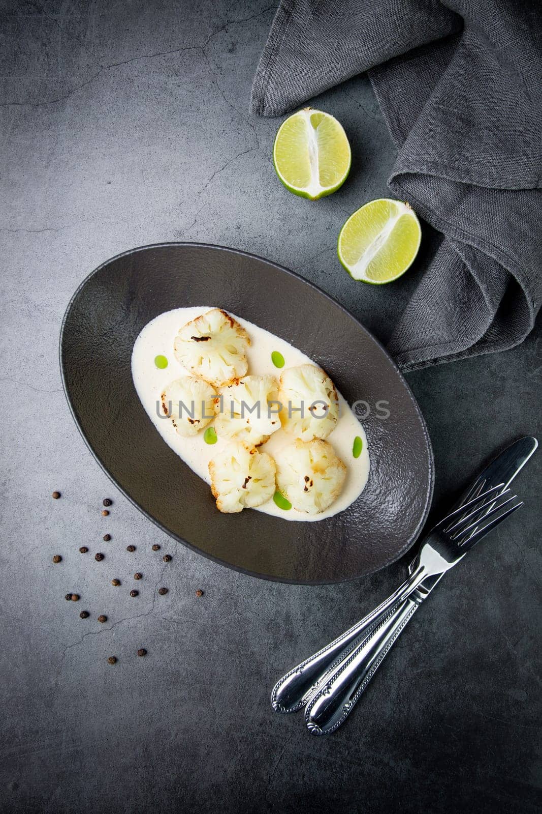 cooked cauliflower in mushroom sauce and lime by tewolf