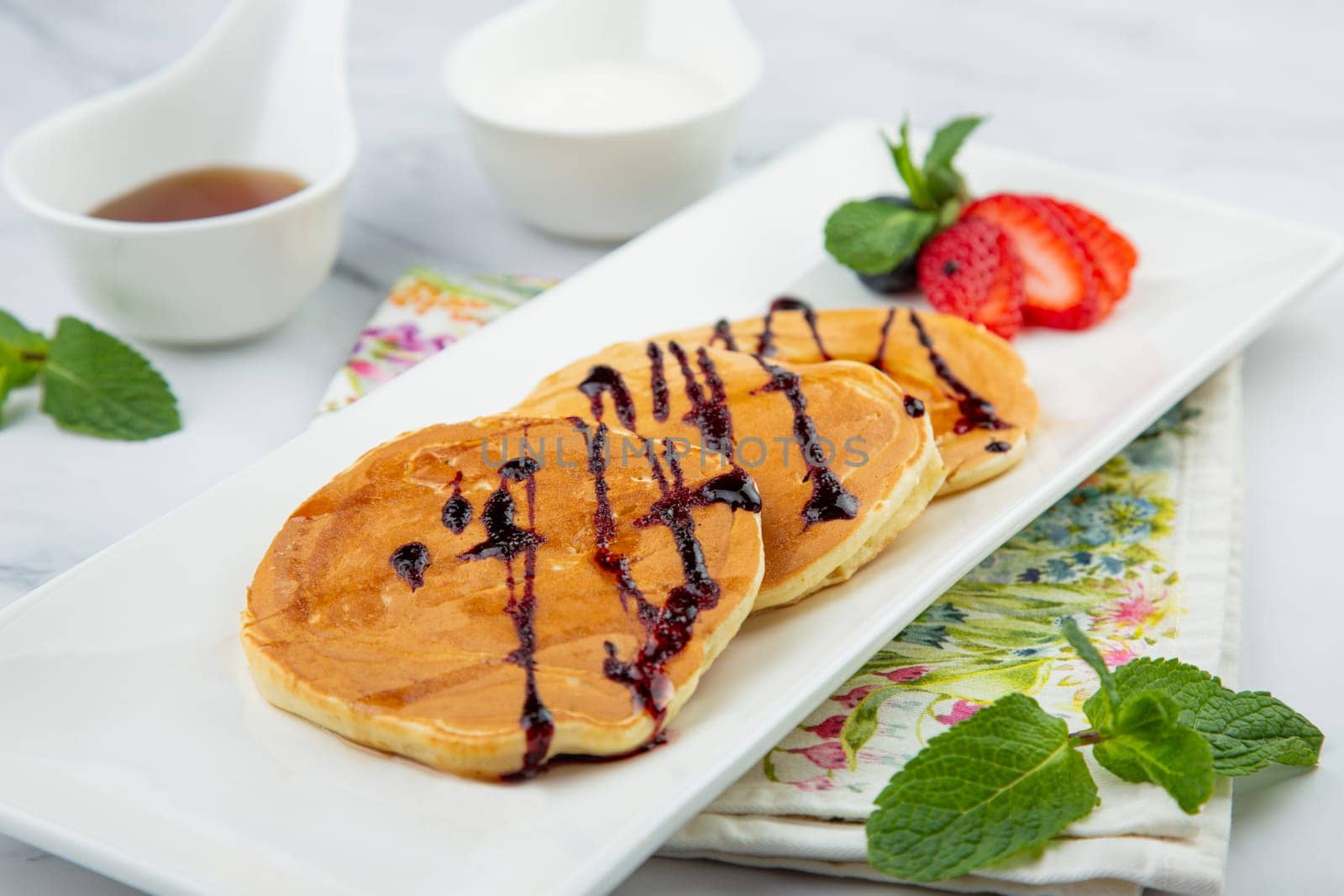 pancakes with chocolate syrup with strawberries and mint by tewolf