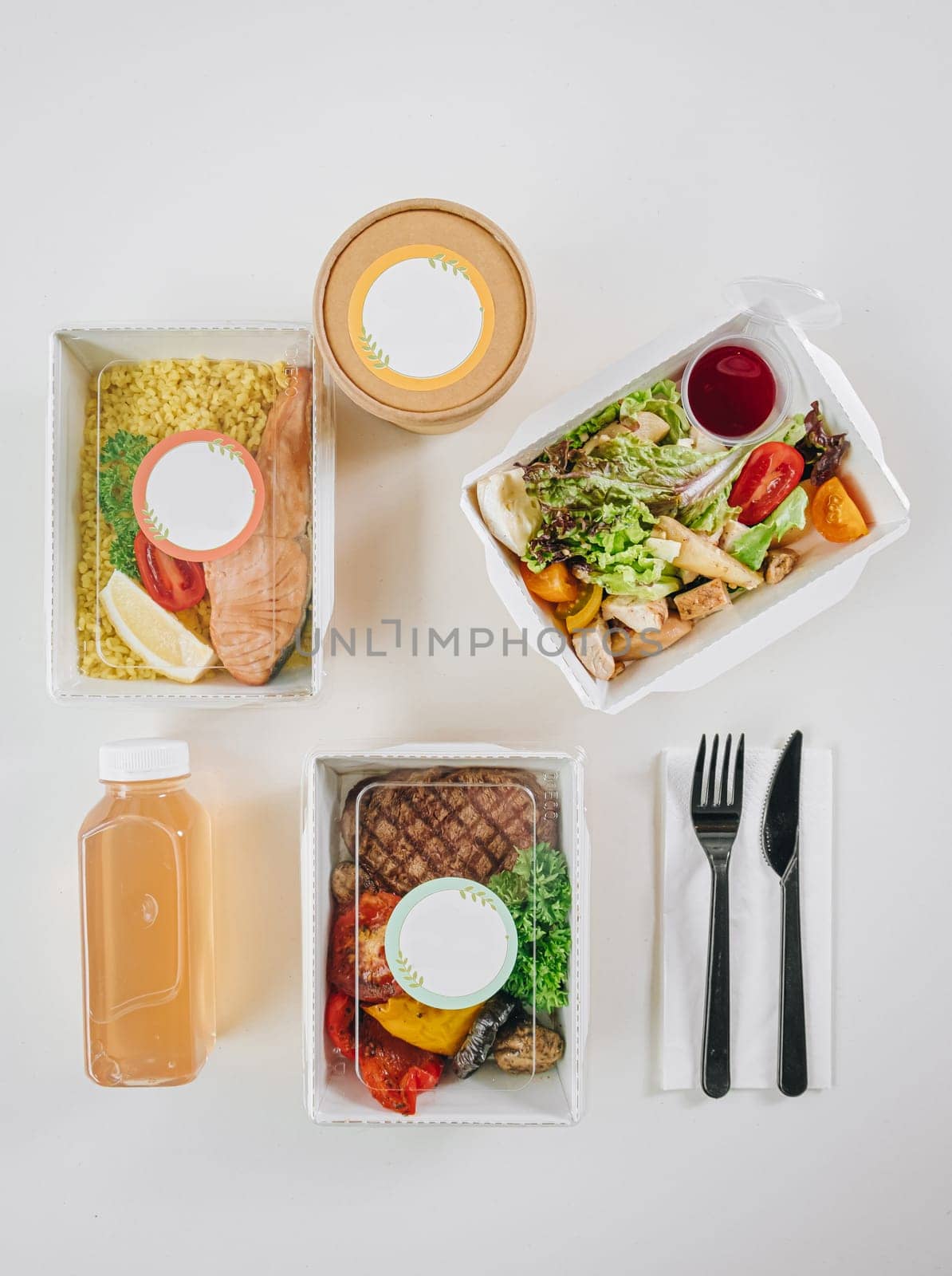 food in containers. proper nutrition, daily diet, weight loss. soup, drink, salad, steak.