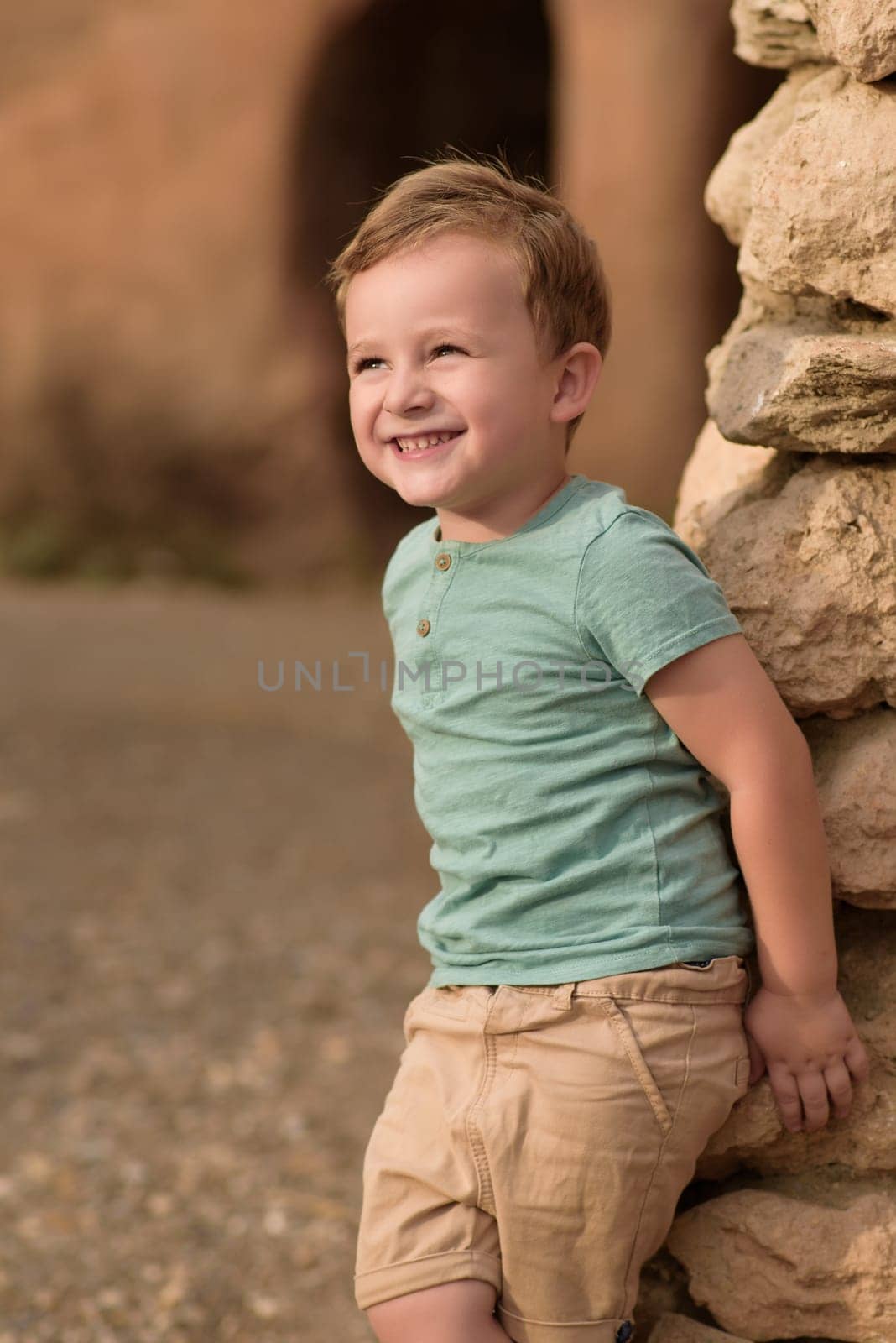 Smiling boy exploring in woods by jcdiazhidalgo