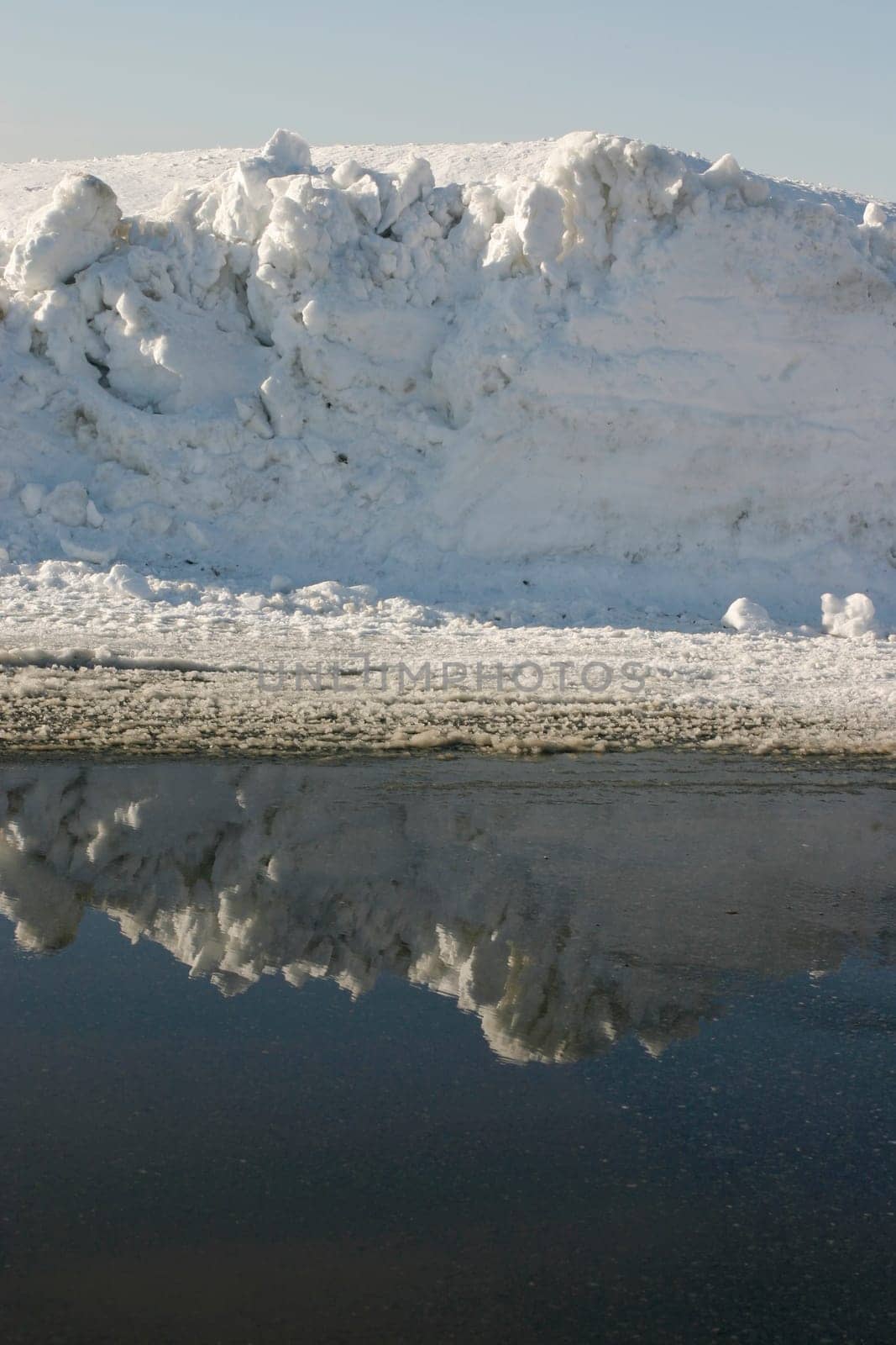 Iceberg reflecting in the water