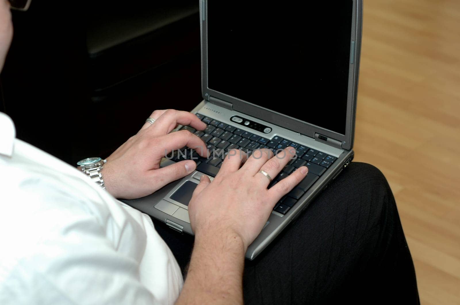 Hands on the laptop