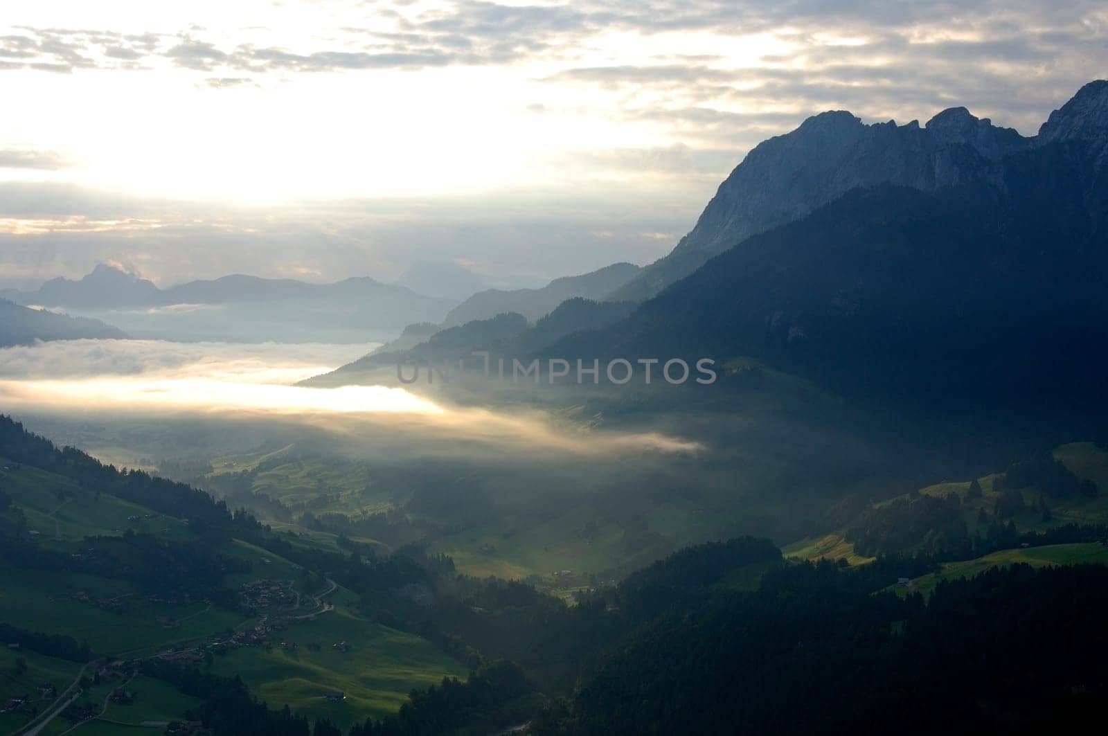 Morning fog in the foothills of the Alps,Château-d'Oex,Switzerland