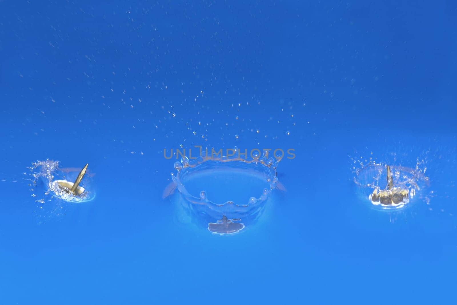 Stitching pins falling into water