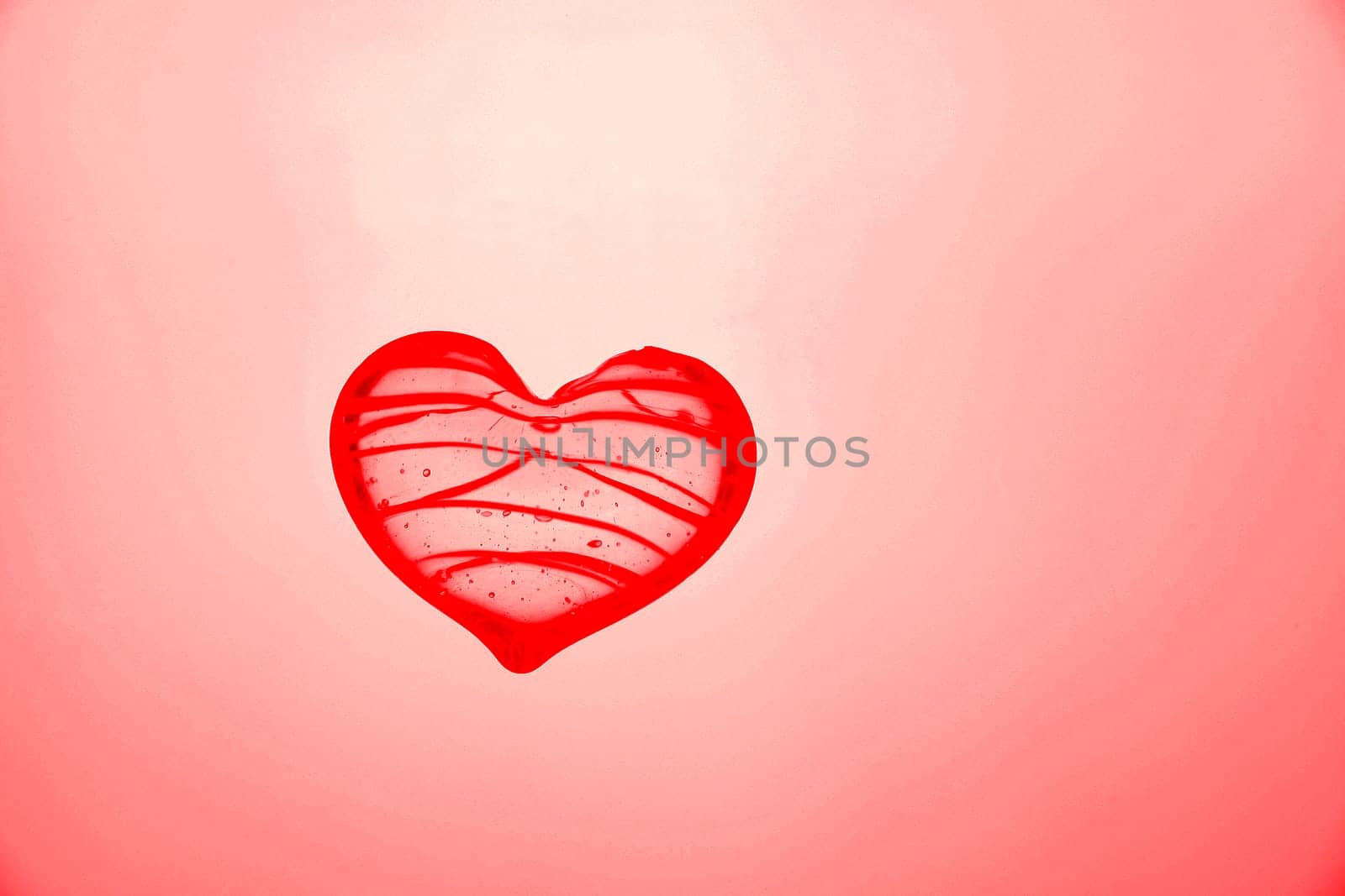 Red heart made of glass