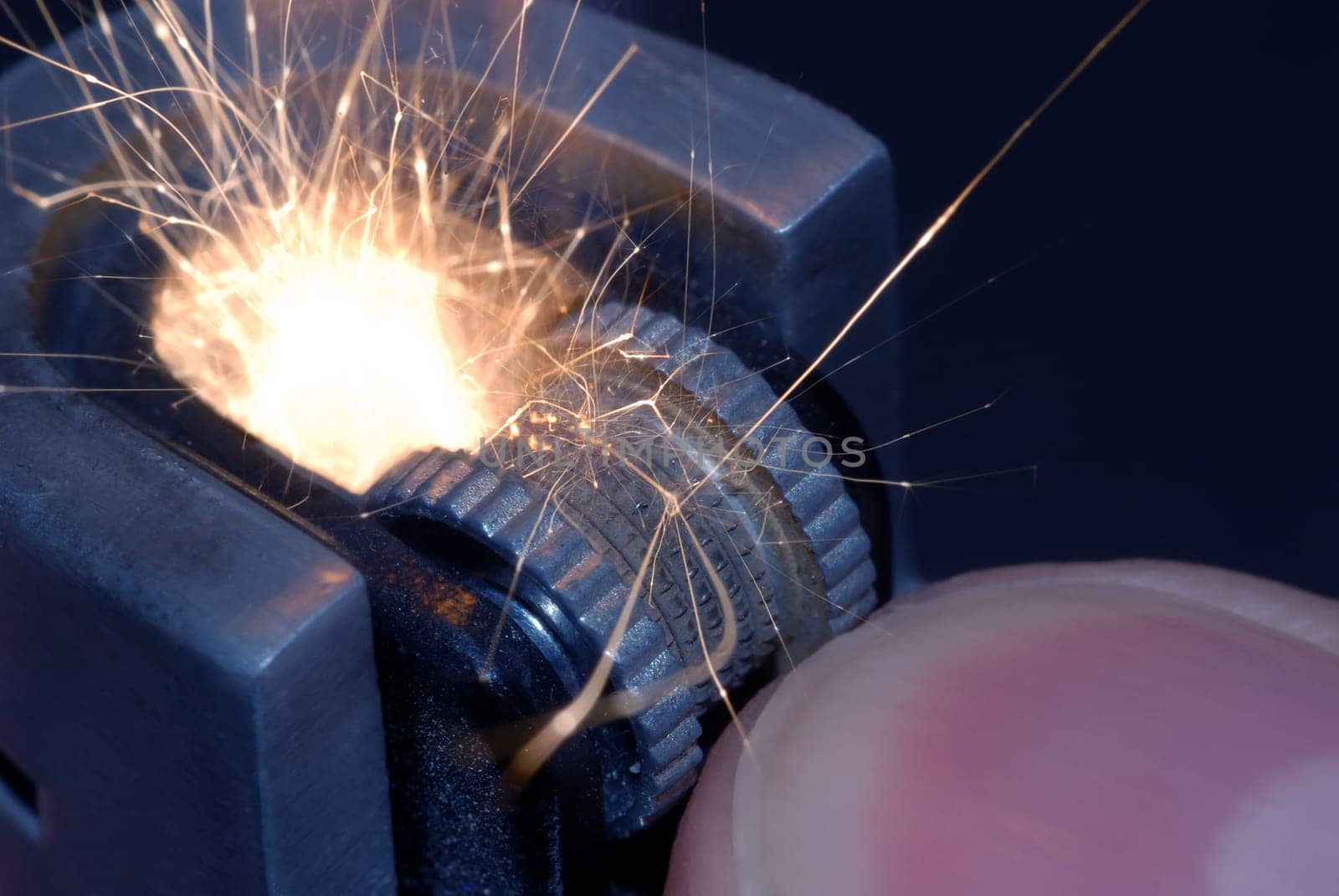 Lighter with sparks