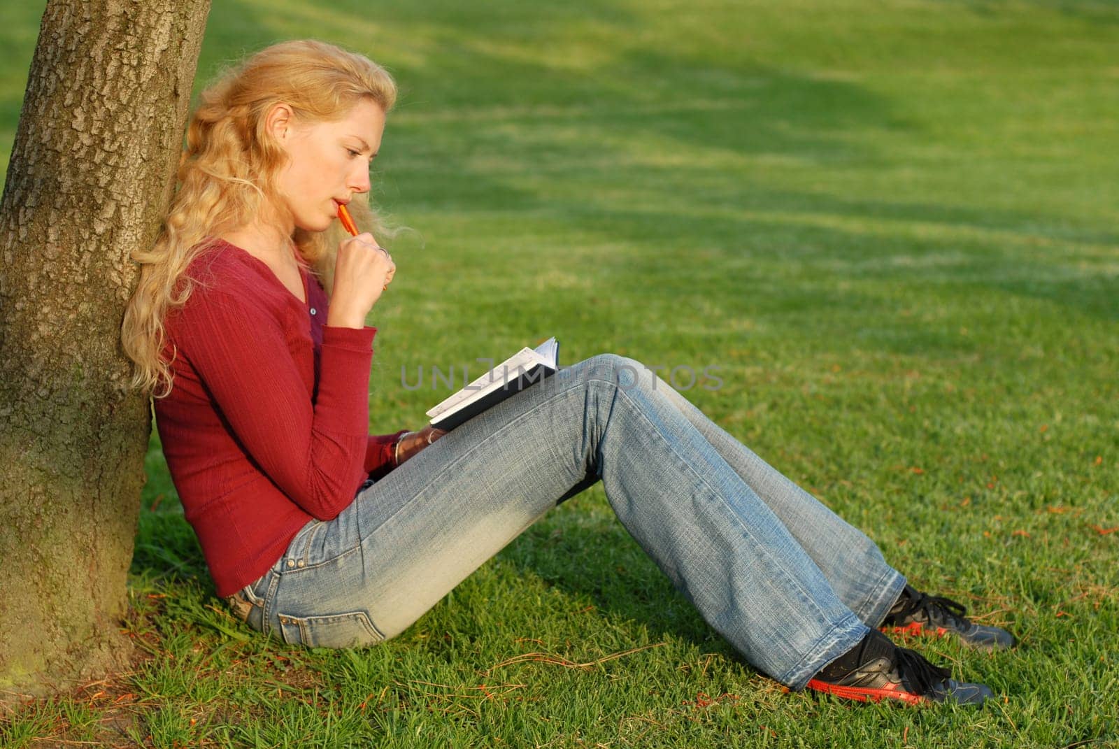 Young woman taking notes