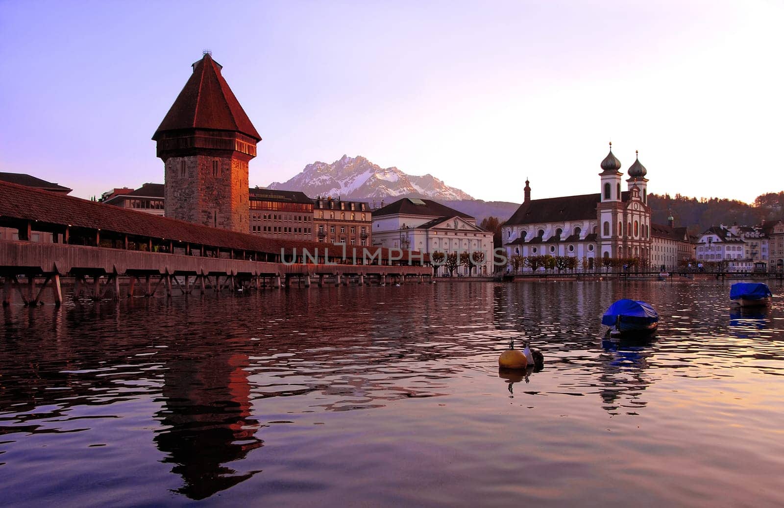 The Chapel Bridge is the landmark of the city of Lucerne and one of the most important tourist attractions. After the Matterhorn,it is probably the most photographed object in Switzerland by tourists.