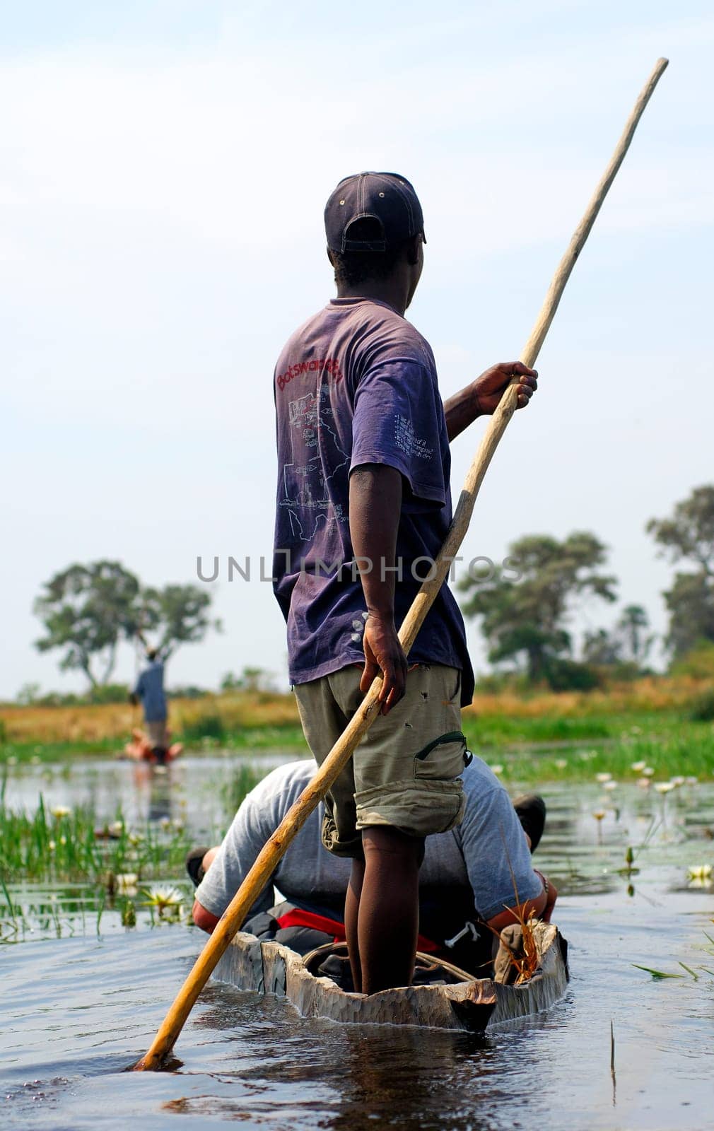 In the Mokoro dugout,Okavango Delta,Botswana