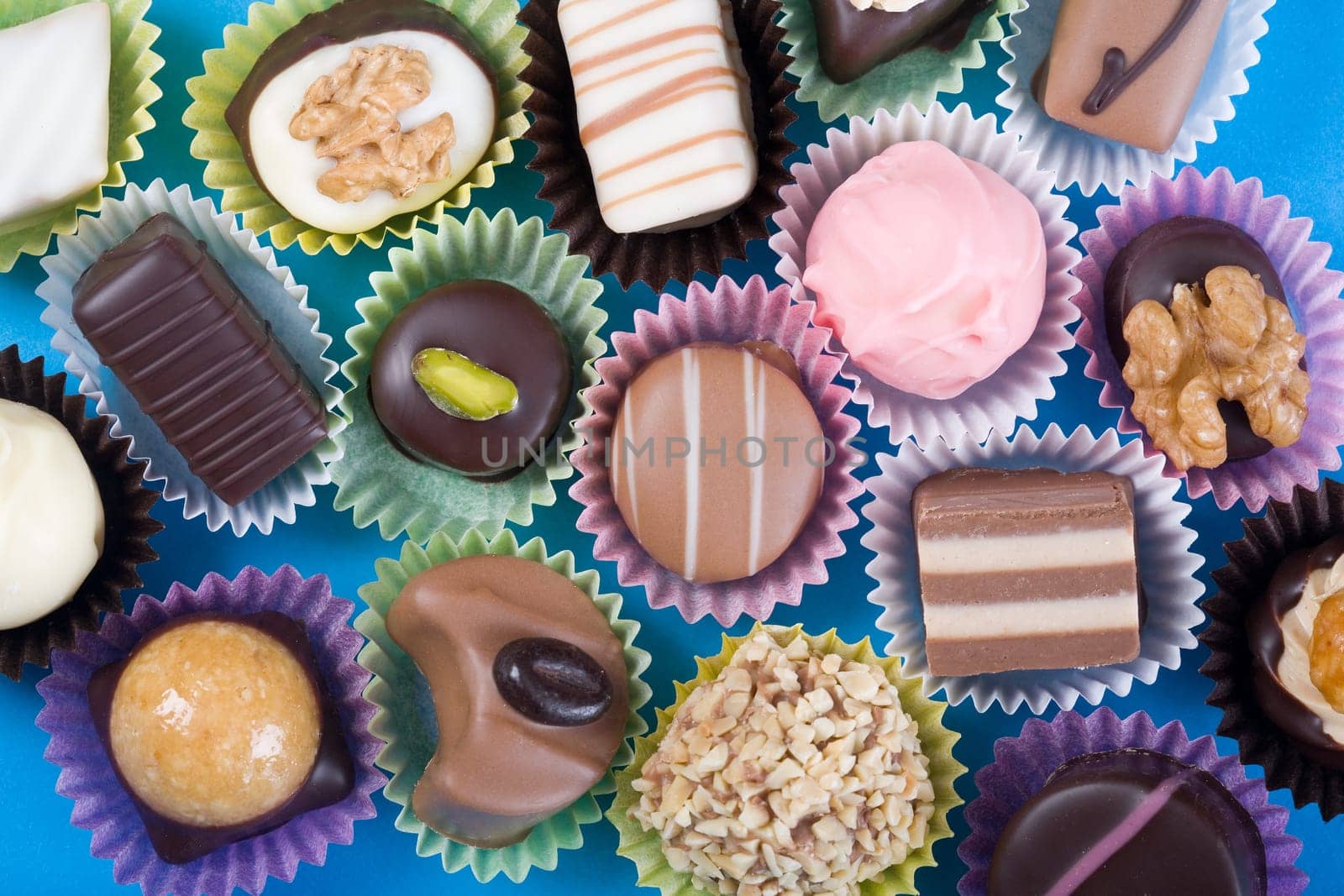 Chocolates from above. Variation. Blue.