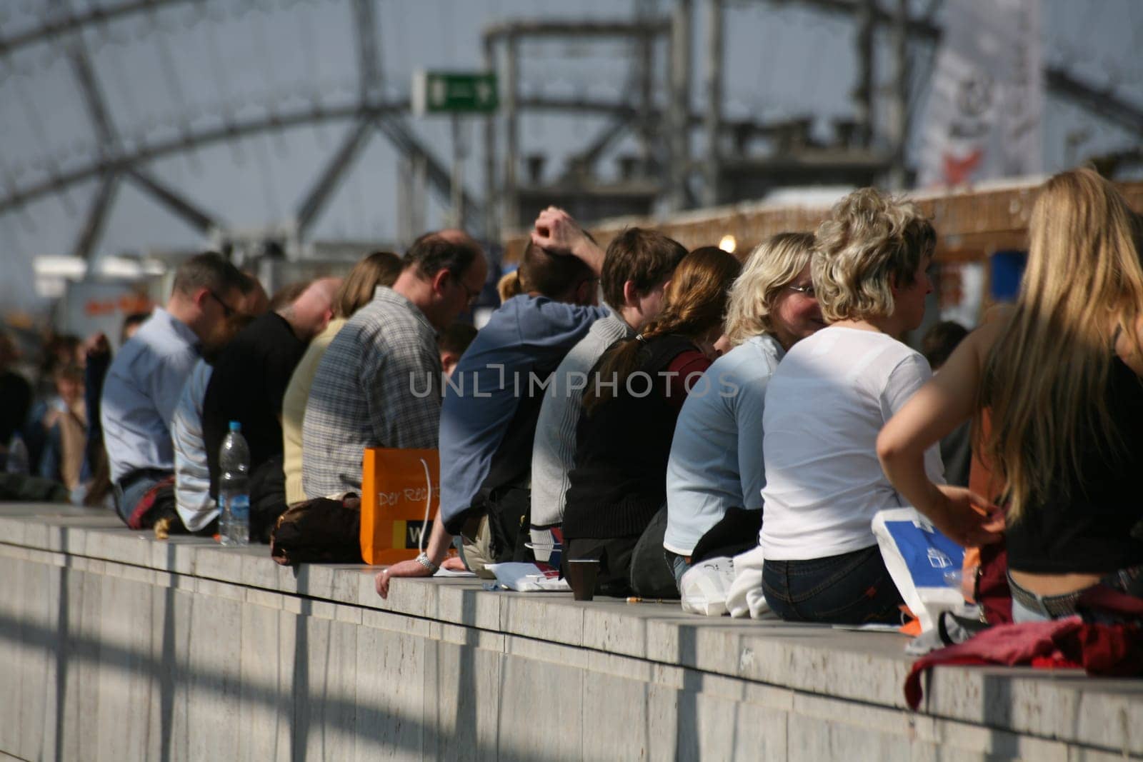 Men and women on a wall