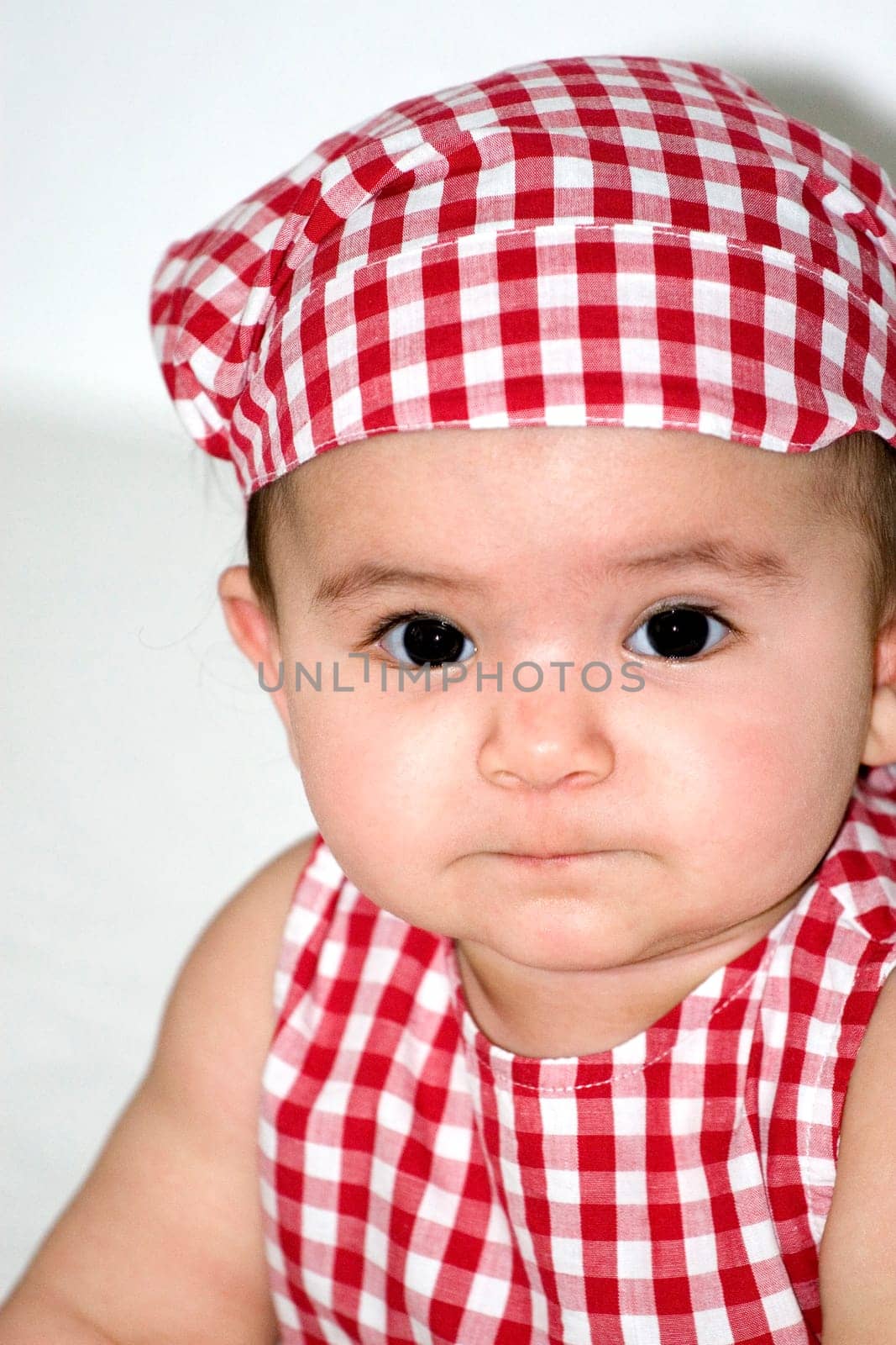 Baby with headscarf