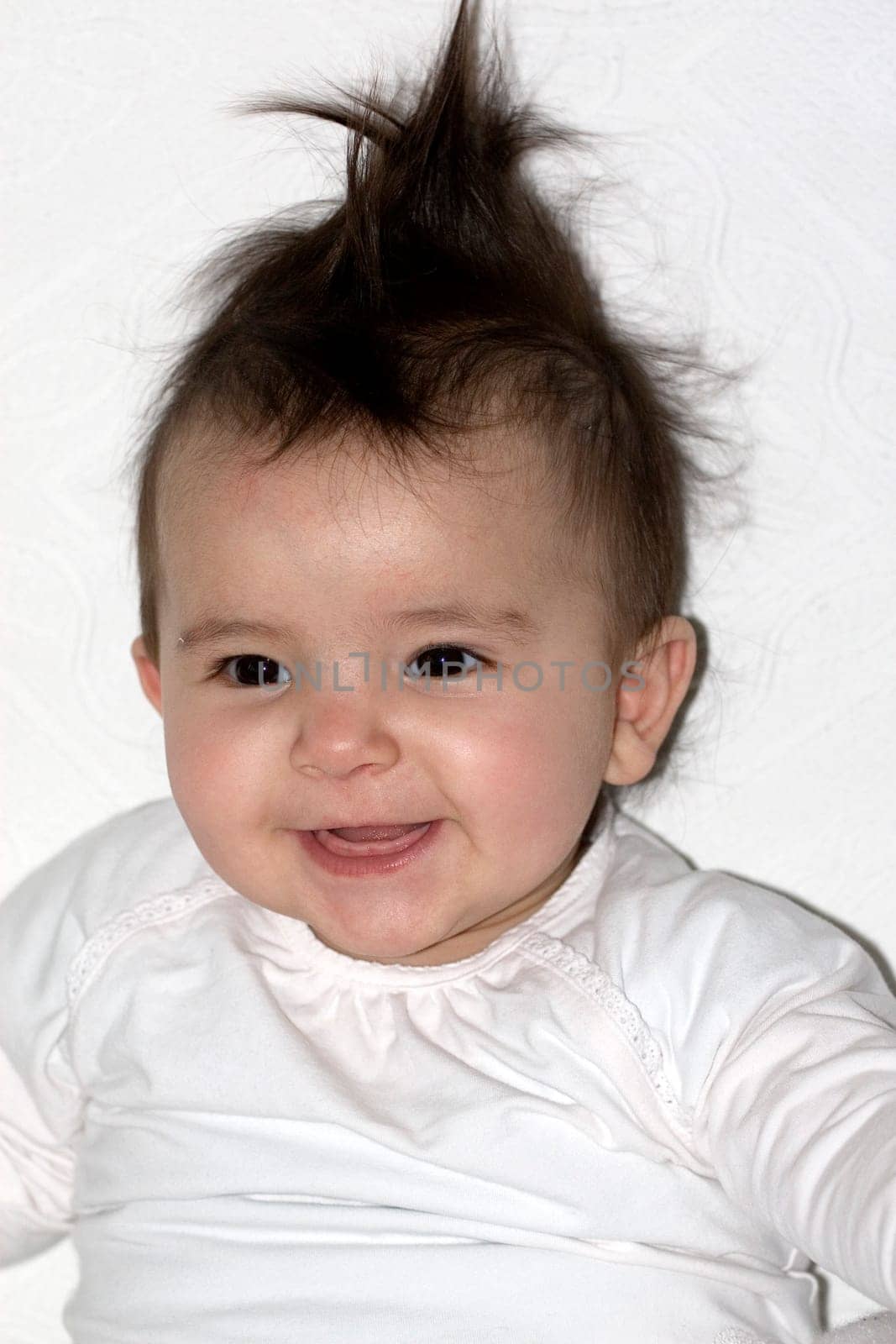 Baby with trendy hairstyle