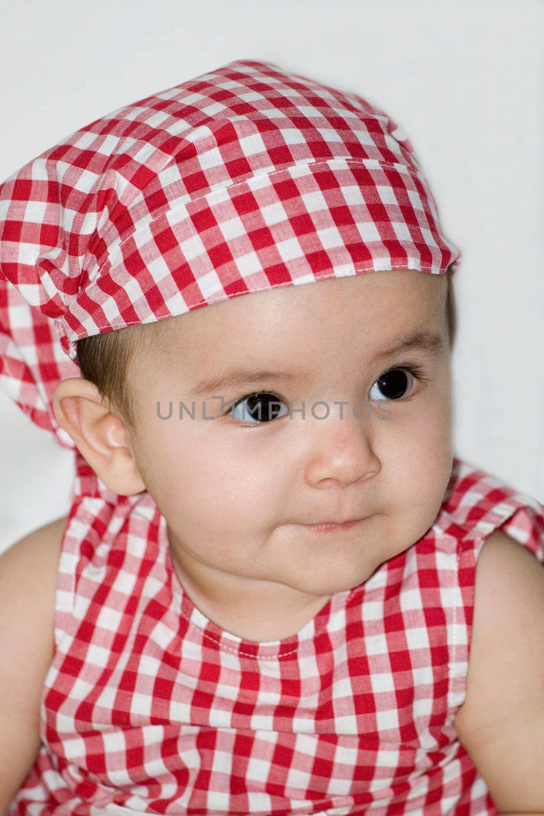 Baby with headscarf