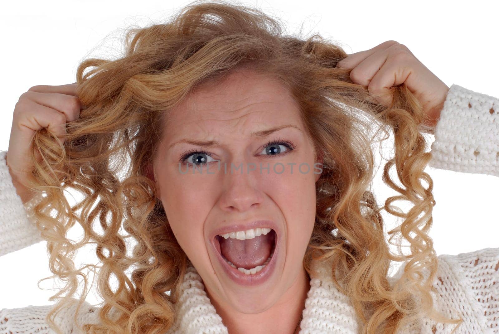 Woman pulls her hair out