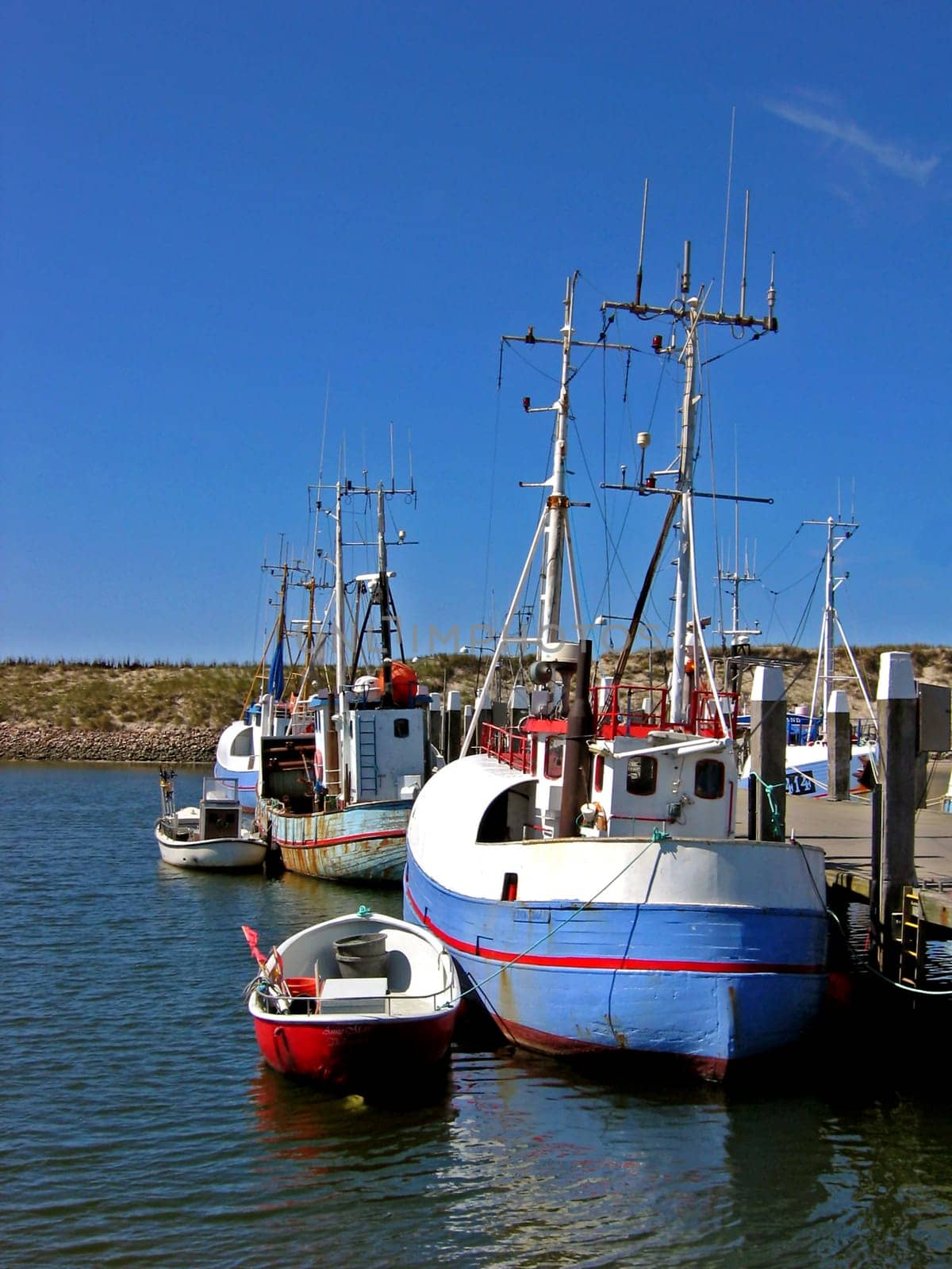 Fishing boats with dinghies
