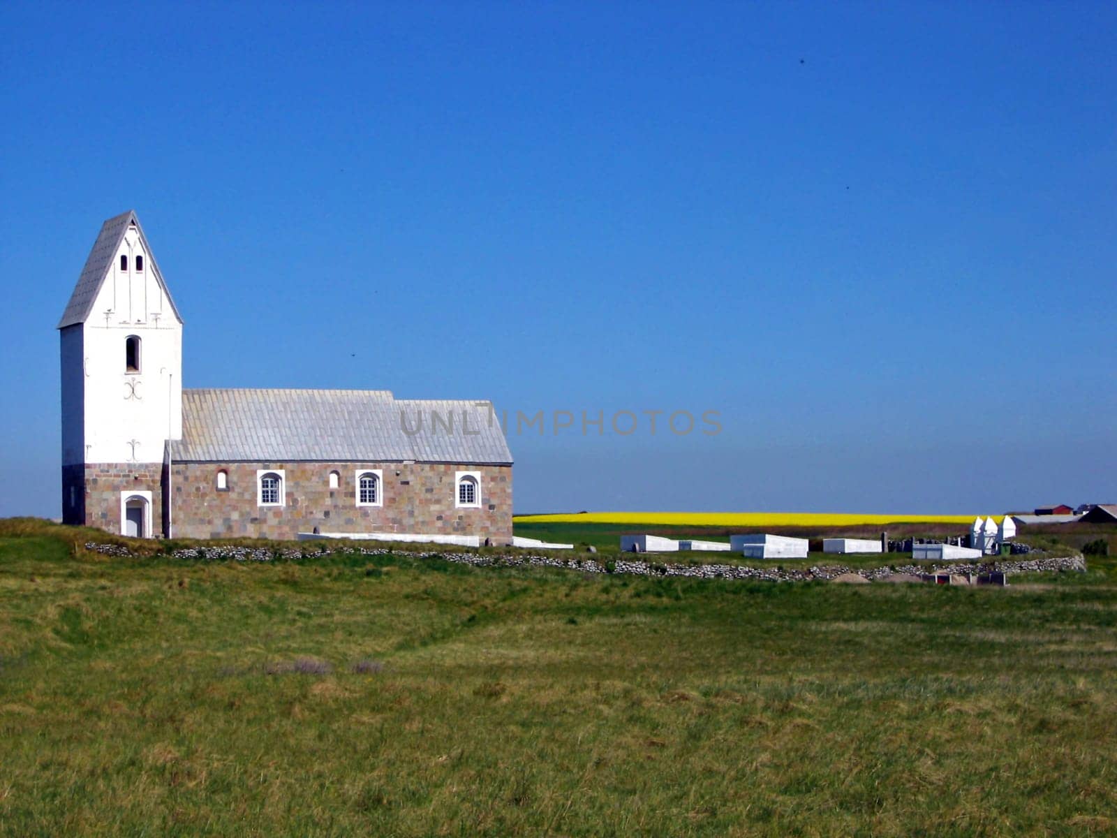 The church of Trans from the year 1200 with its special location on a cliff directly on the North Sea (unfortunately you can't see it in this setting).