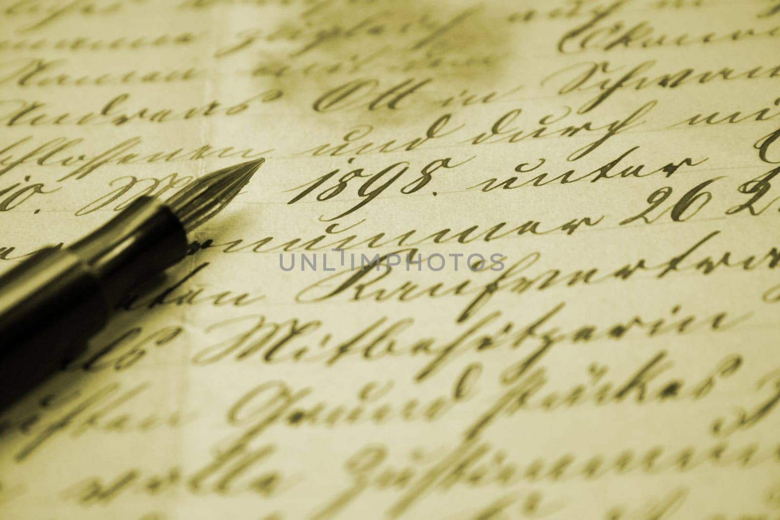 Fountain pen and old font