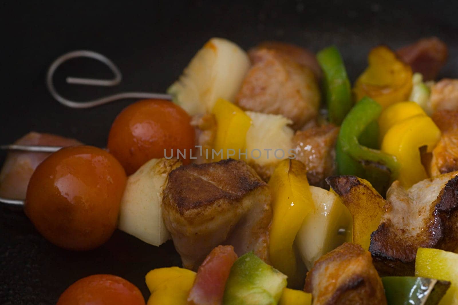 Shish kebab skewers in the pan