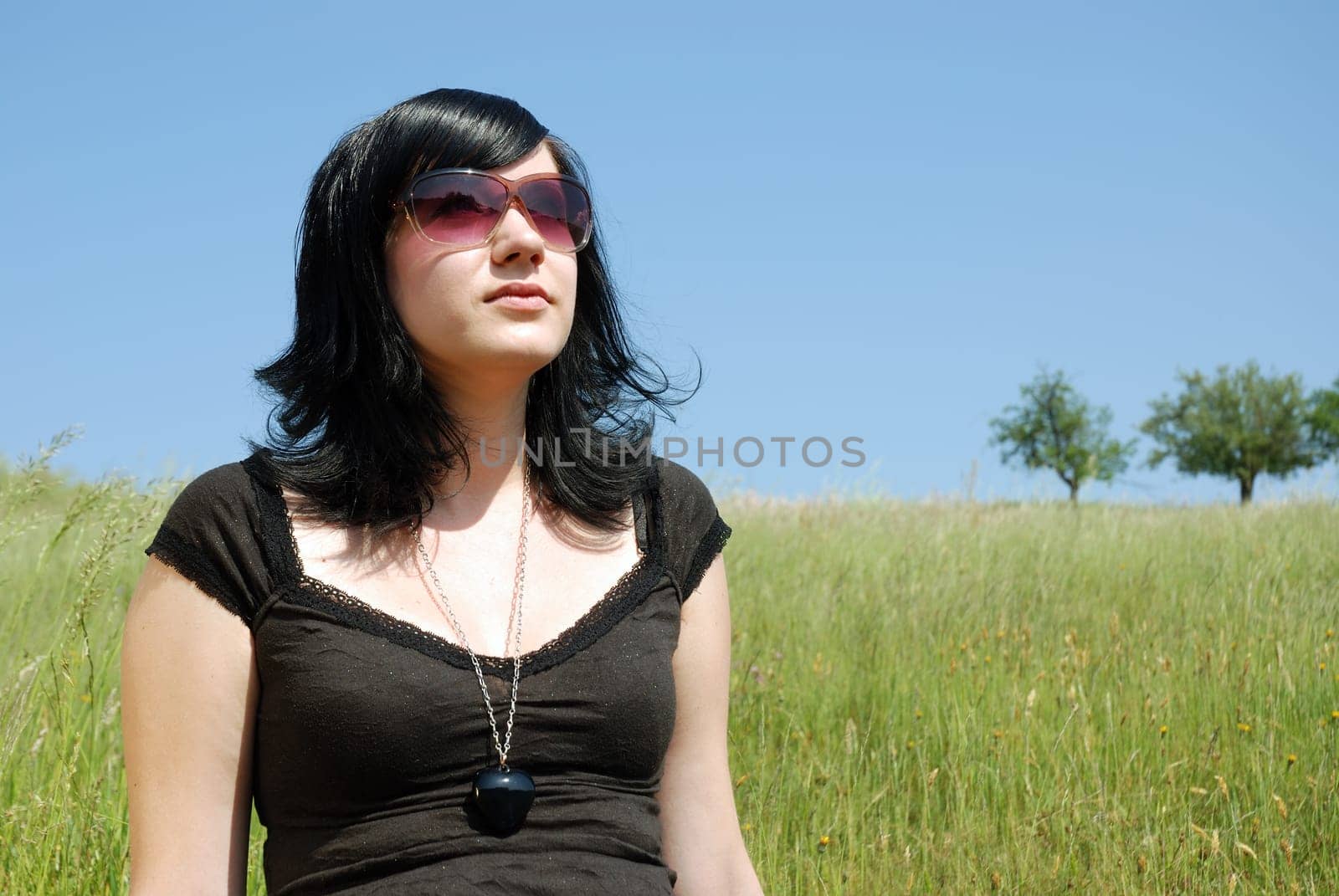 Young woman in the grass