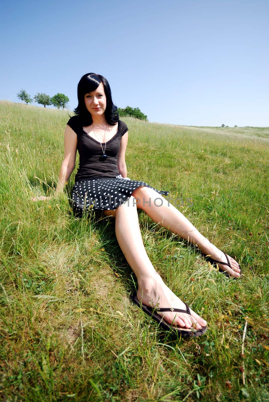 Young woman in the grass