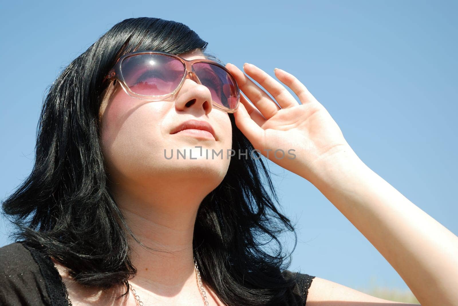 Young woman wearing sunglasses