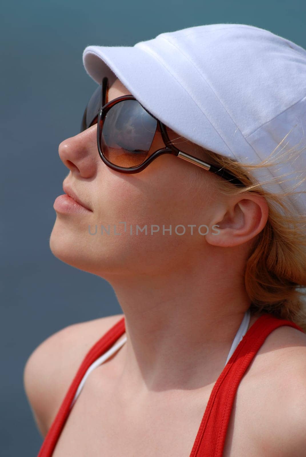 Young woman by the sea