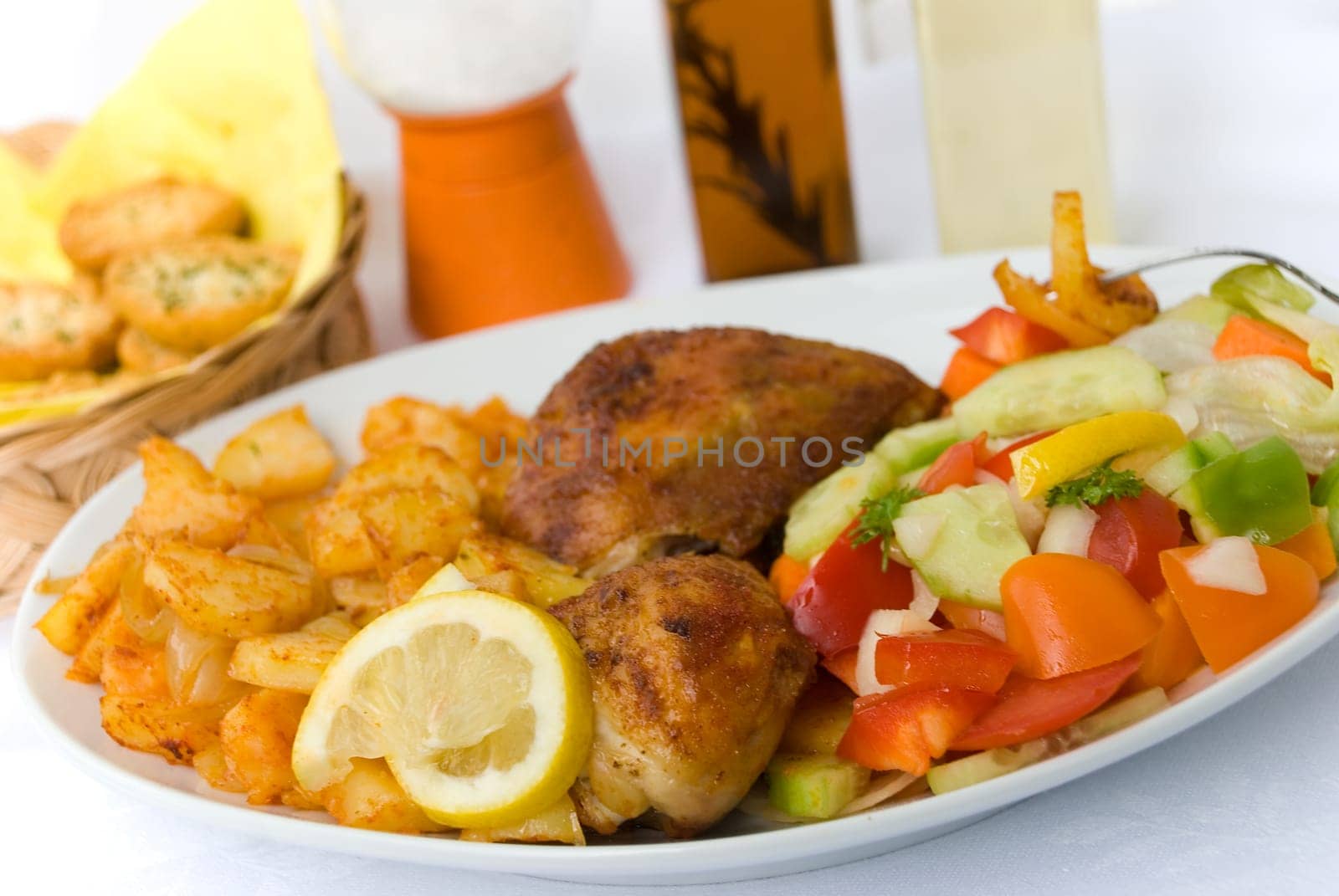 Chicken thighs with mixed salad