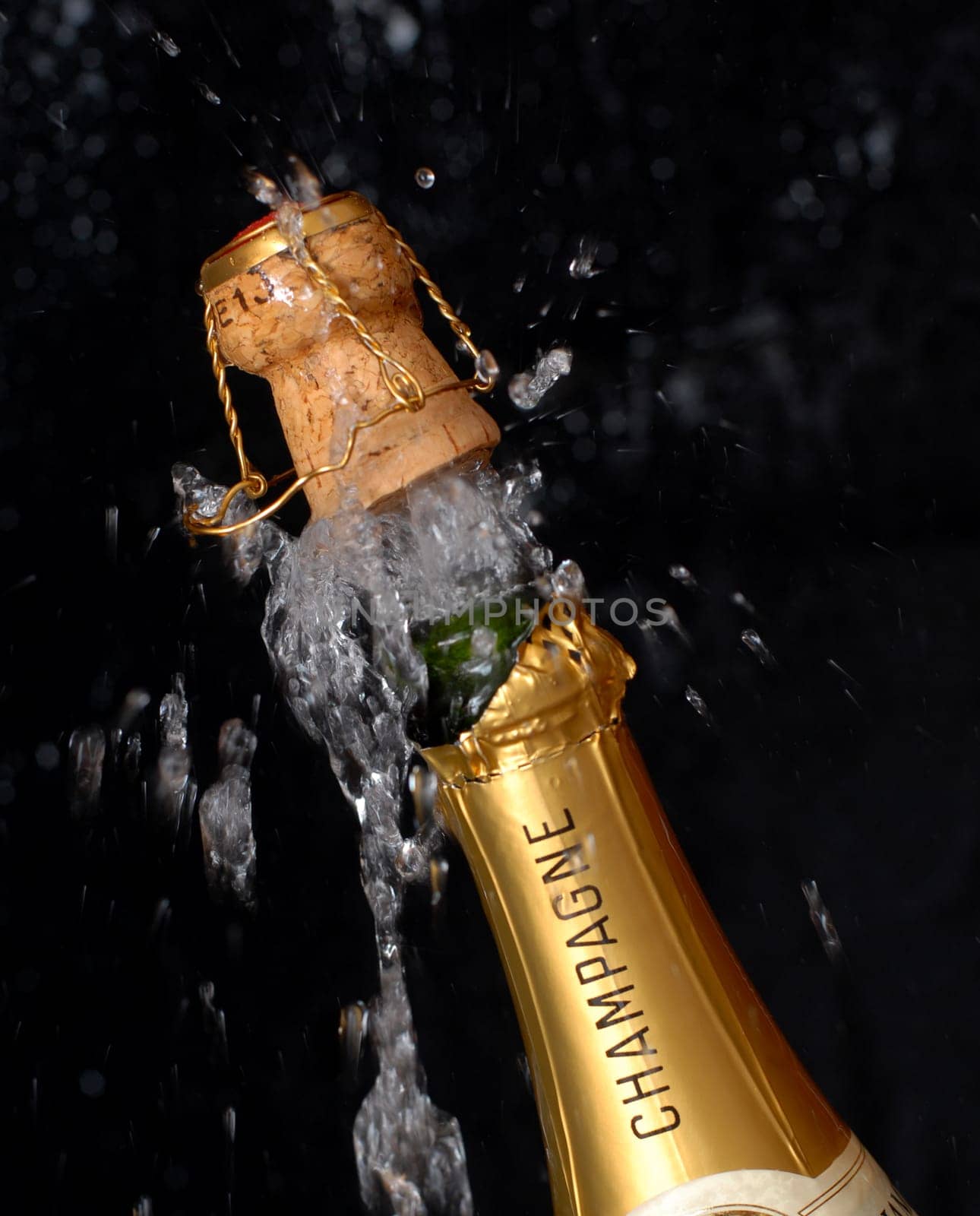 Popping champagne bottle