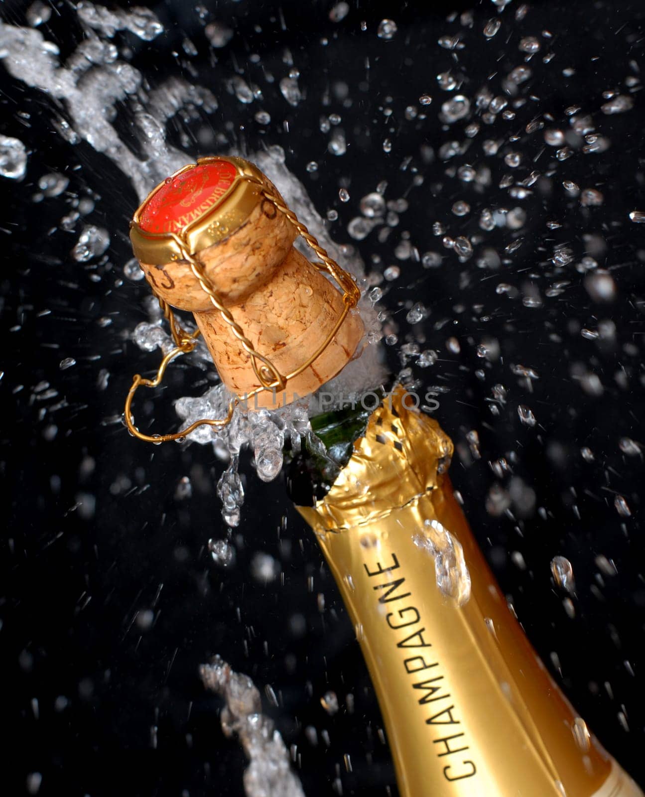 Popping champagne bottle