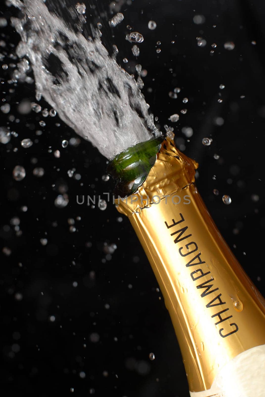 Popping champagne bottle