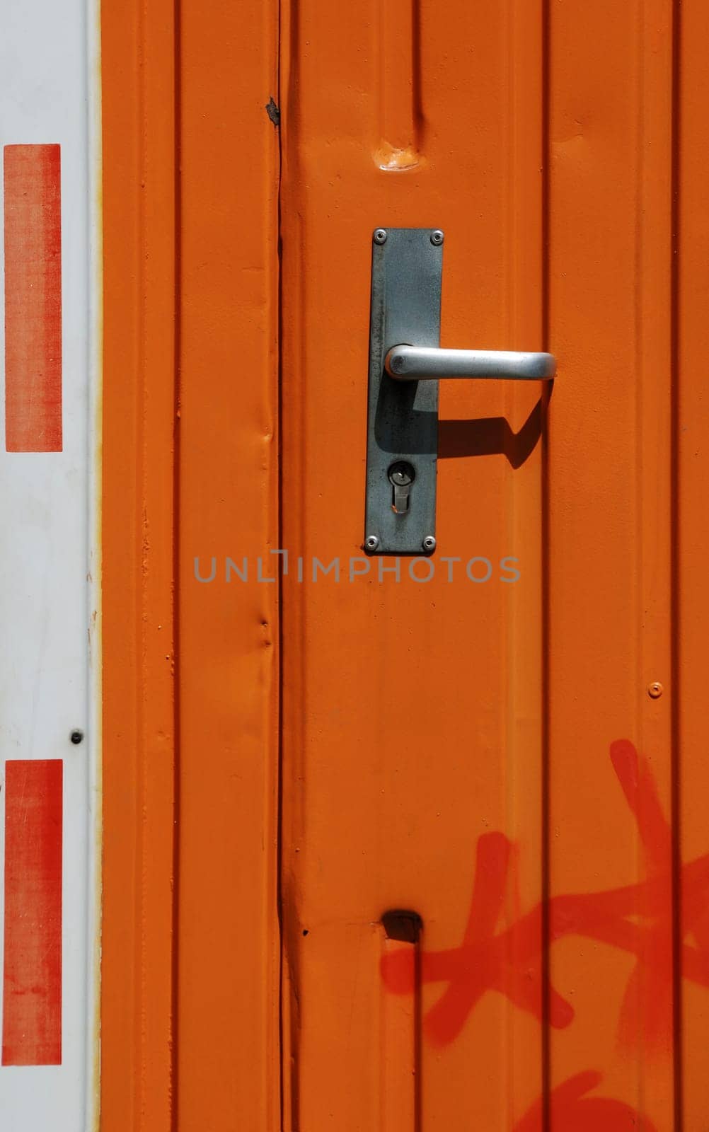 Orange sheet metal door