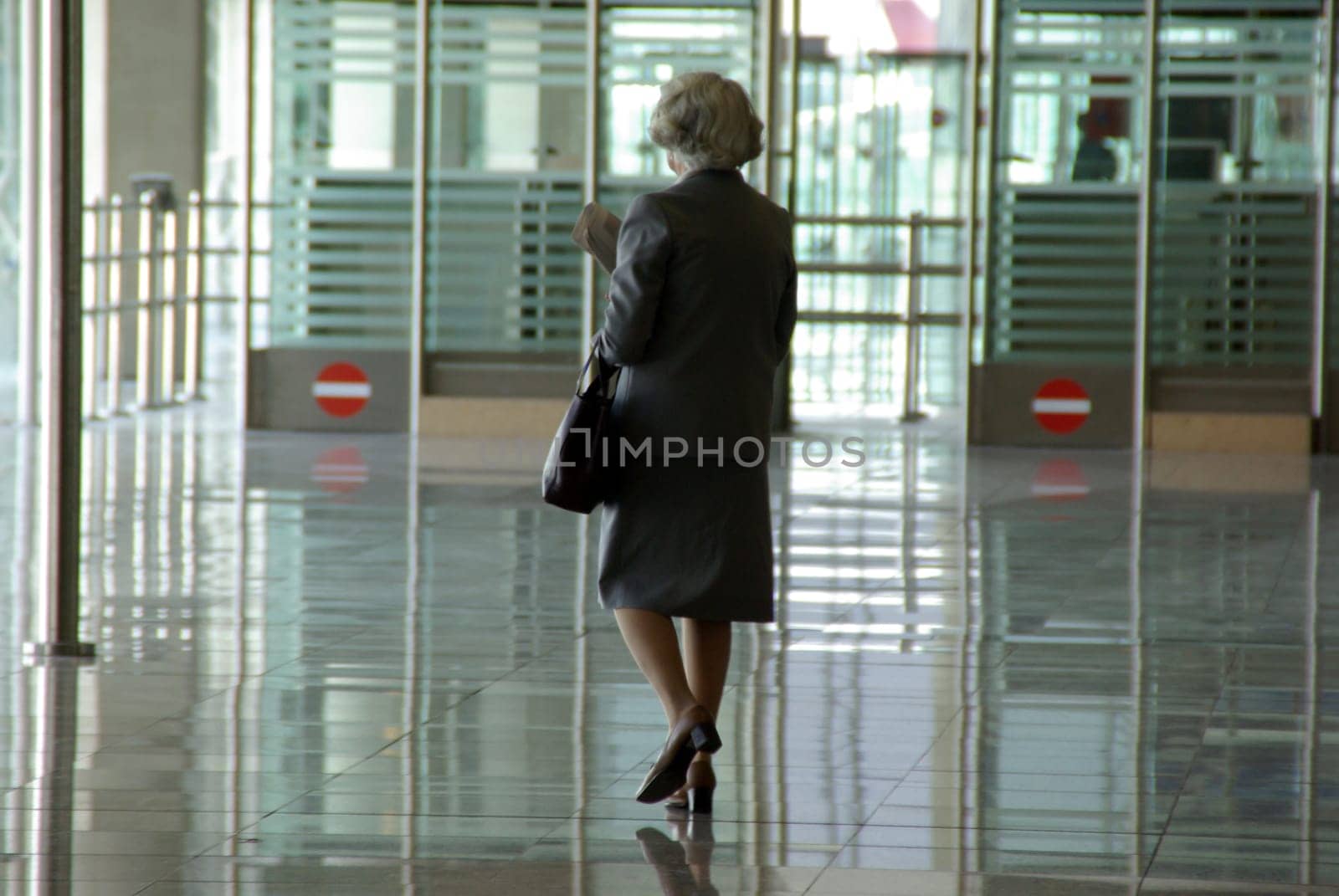 elderly lady on the road