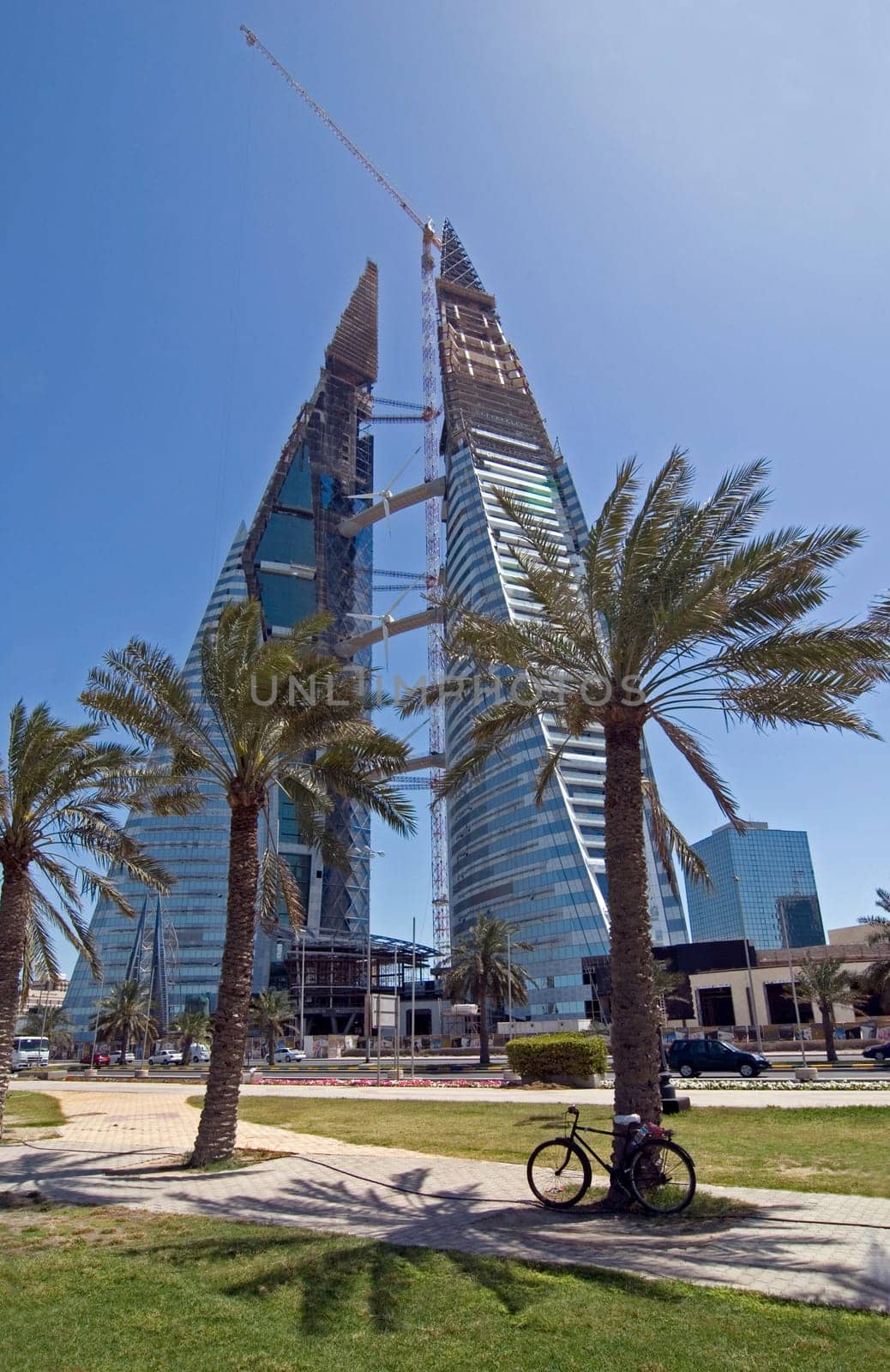 Bike break in the midday heat in front of the new World Trade Centre in Manama/Bahrain.