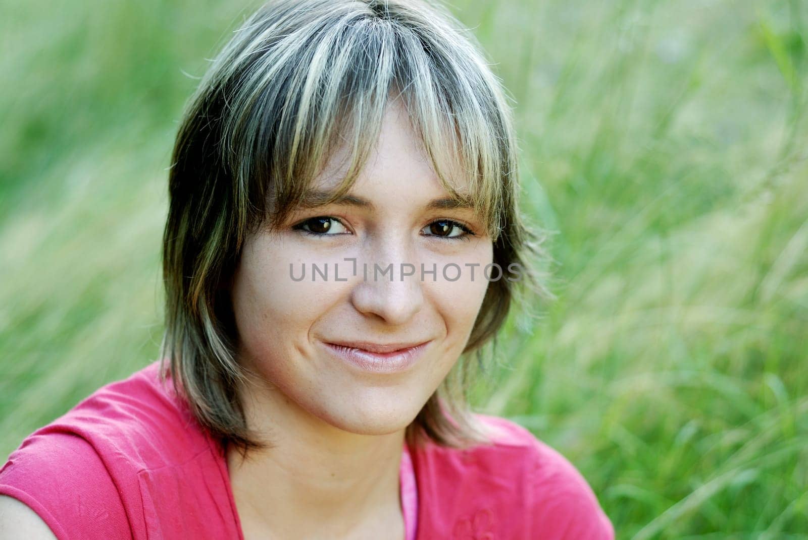 Young woman in the grass
