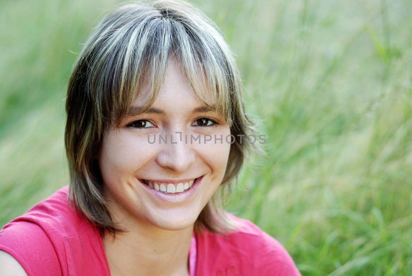 Young woman in the grass