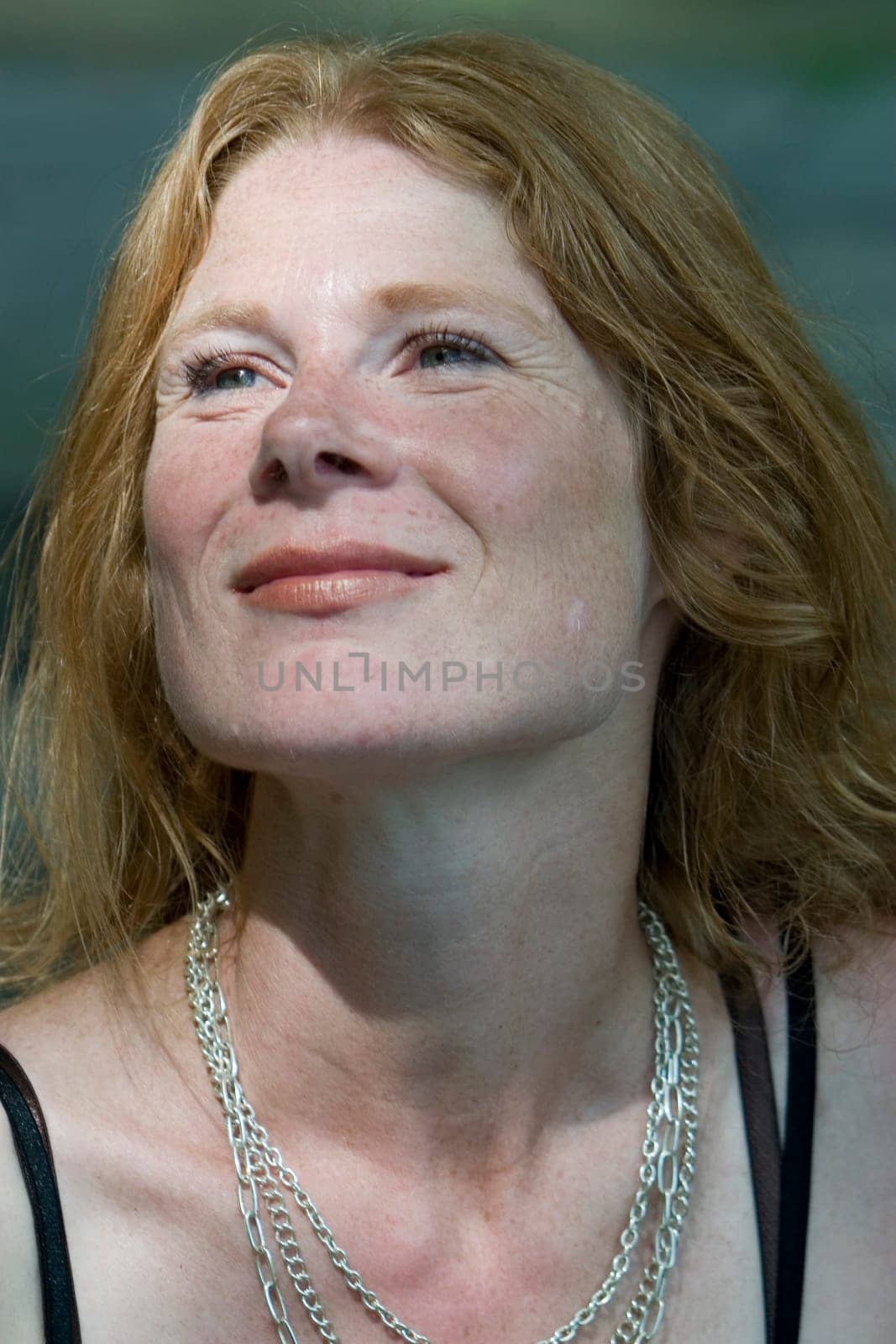 red-haired woman over 40