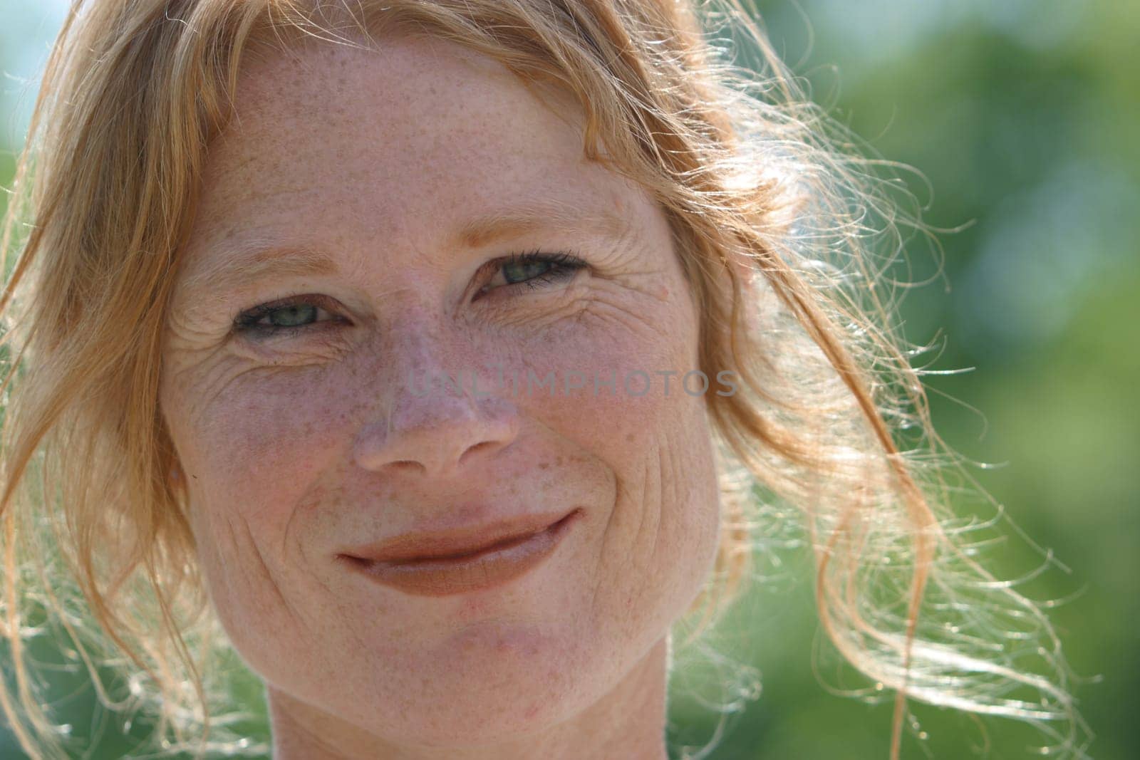 red-haired woman over 40
