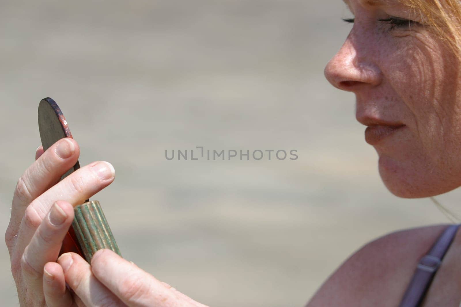 red-haired woman over 40