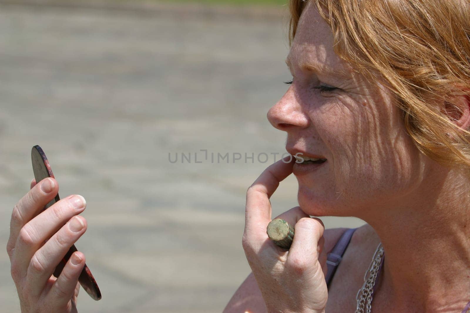 red-haired woman over 40