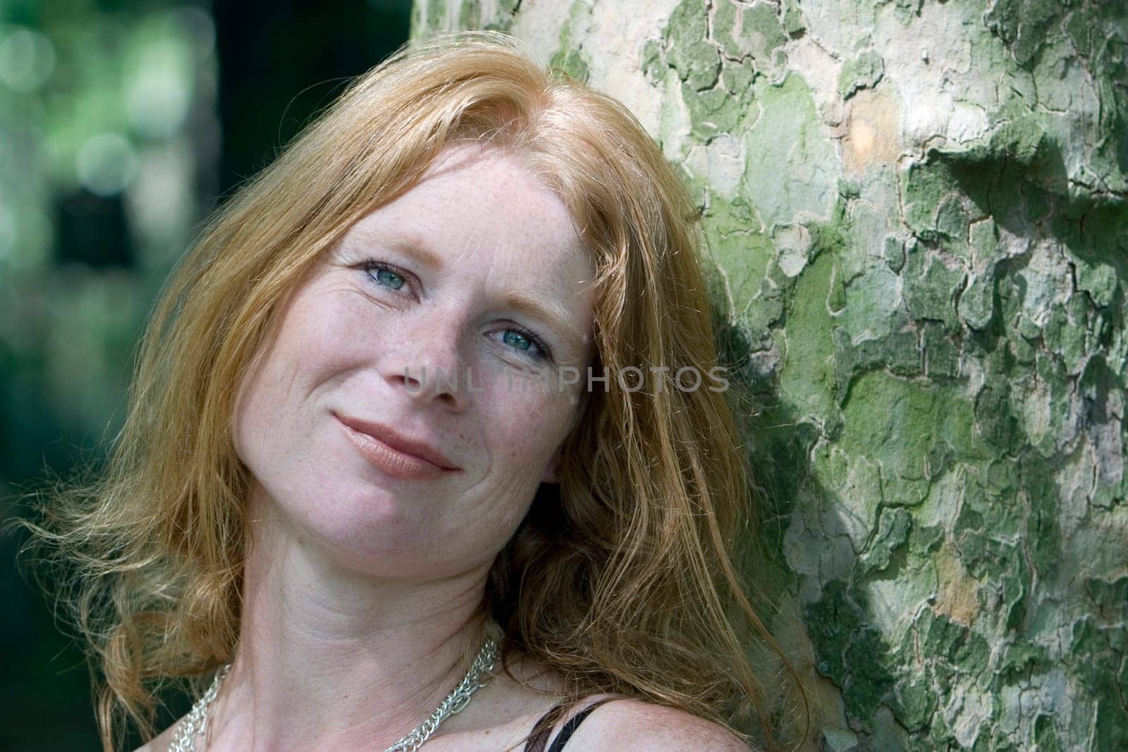 red-haired woman over 40