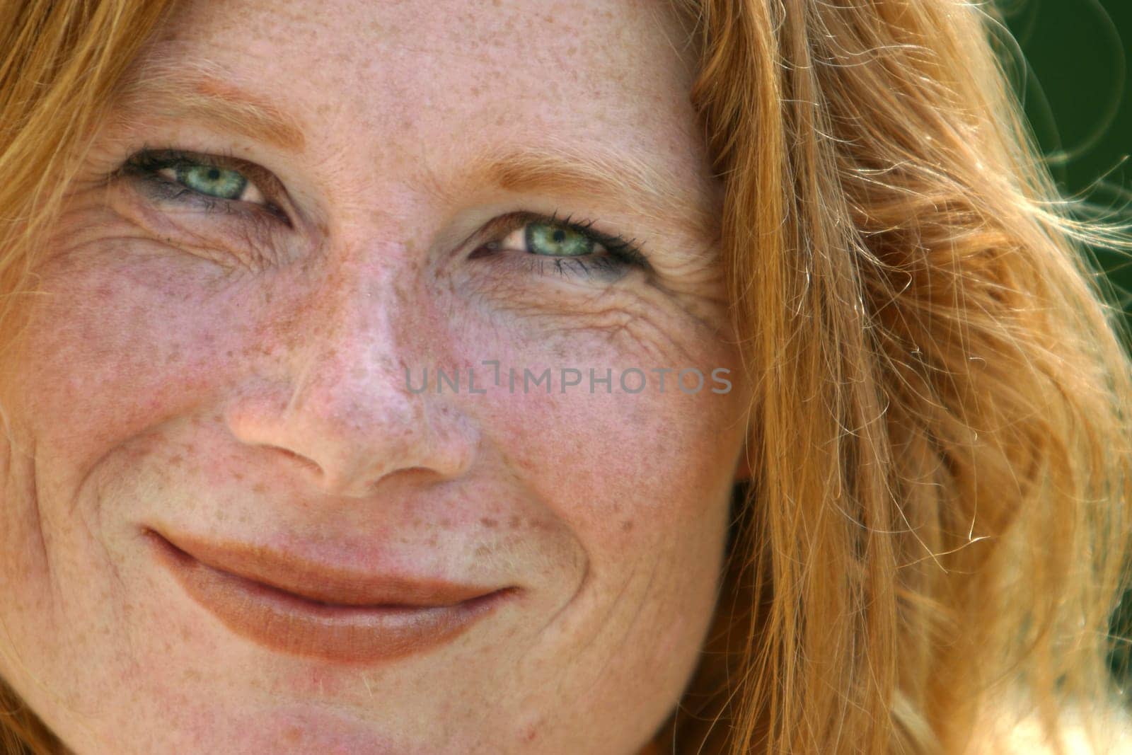 red-haired woman over 40