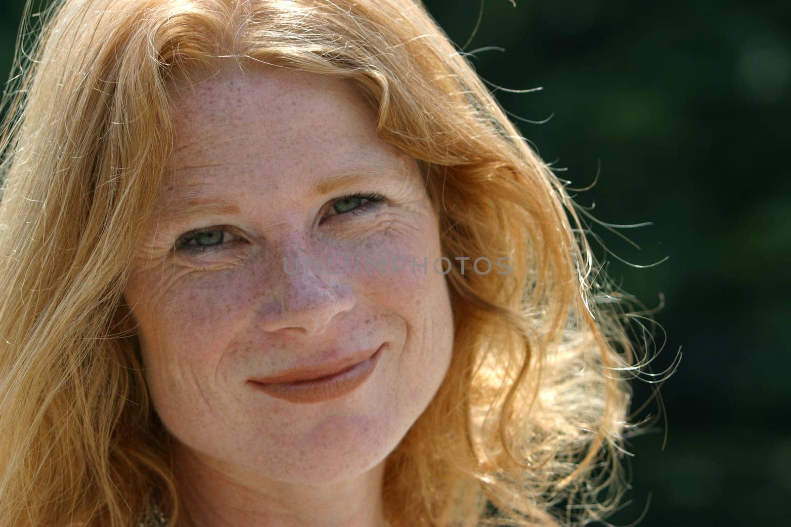 red-haired woman over 40